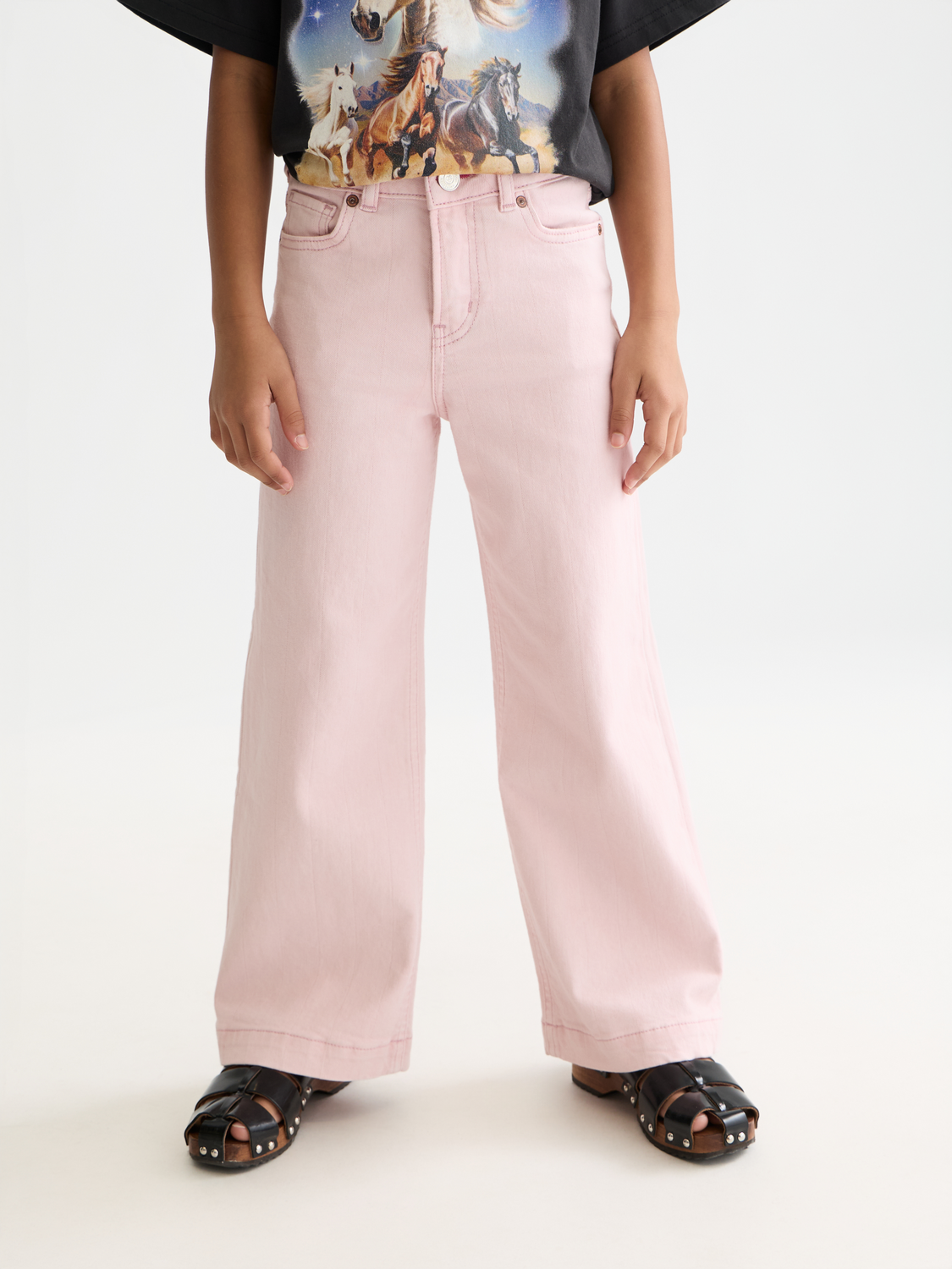 Kids' wave wide-fit denim jeans by Scotch & Soda featuring a stylish design and comfortable fit, shown in a front view.