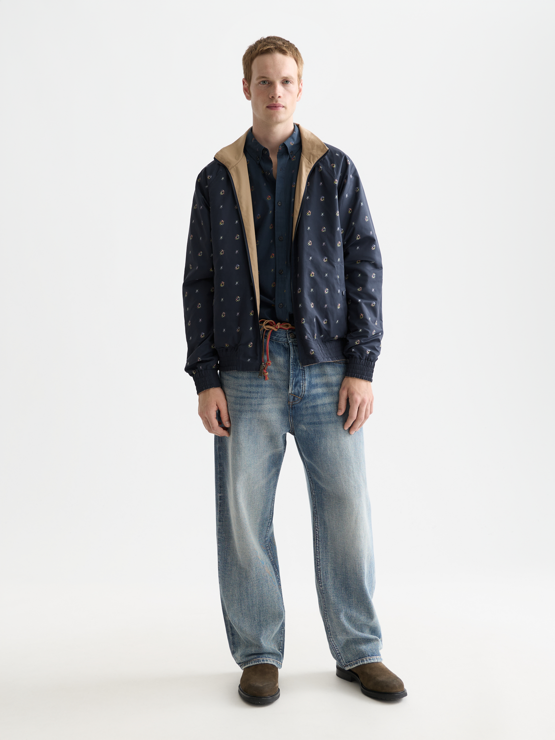 Reversible Scotch & Soda jacket with front view, showing both patterned and solid fabric sides.