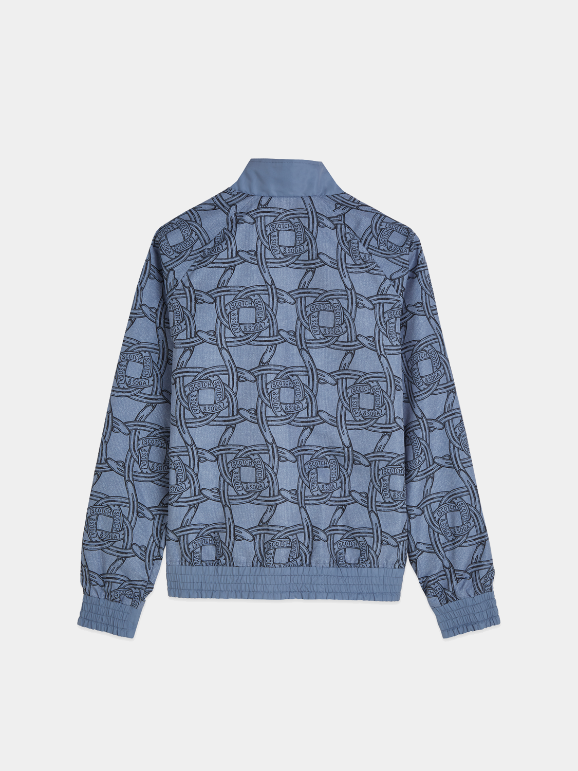 Reversible printed jacket from Scotch & Soda, showing one side with a bold, colorful pattern and the other side in solid black.