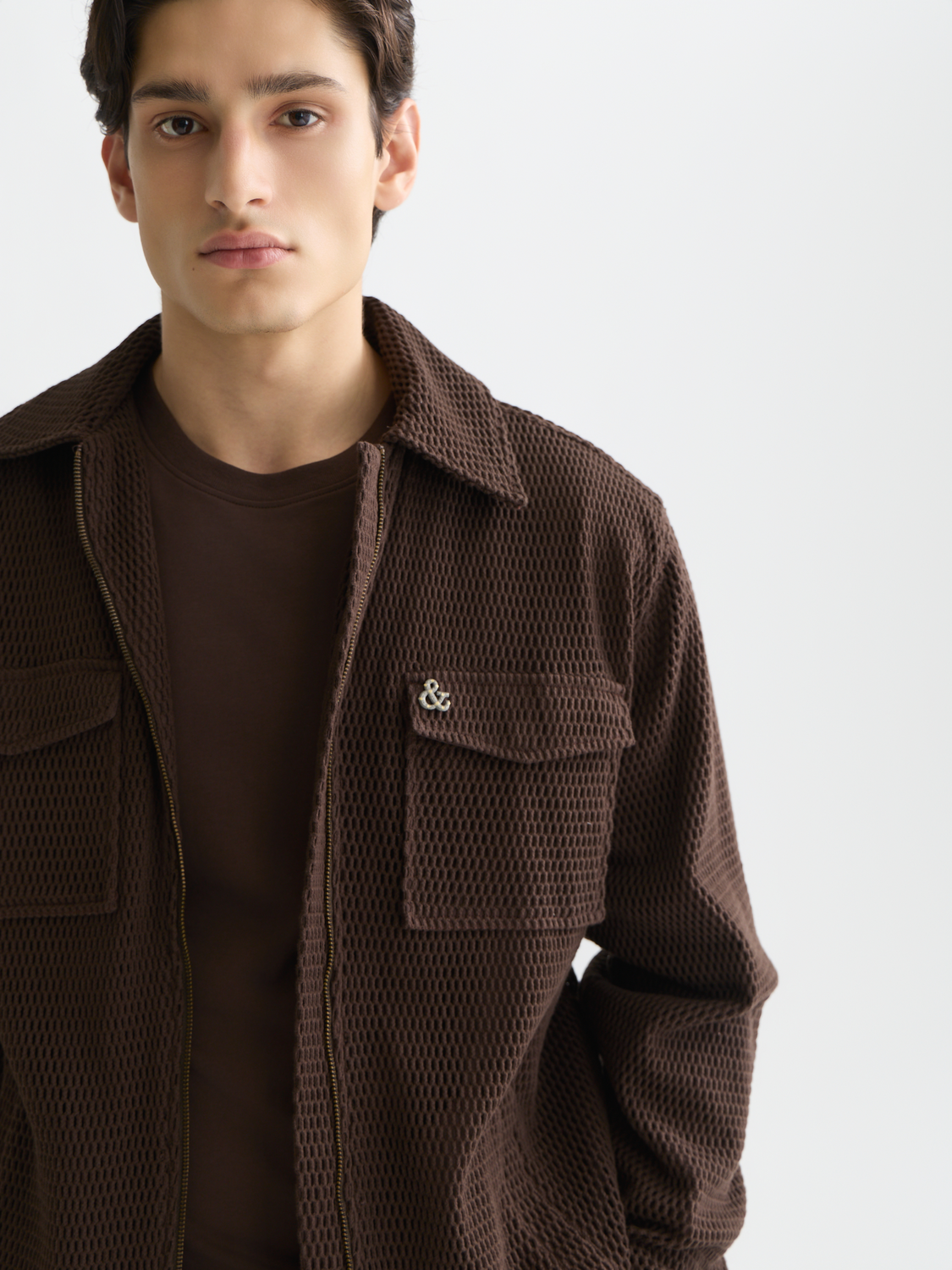 Structured overshirt jacket by Scotch & Soda featuring a tailored fit and classic design, displayed in a neutral color.