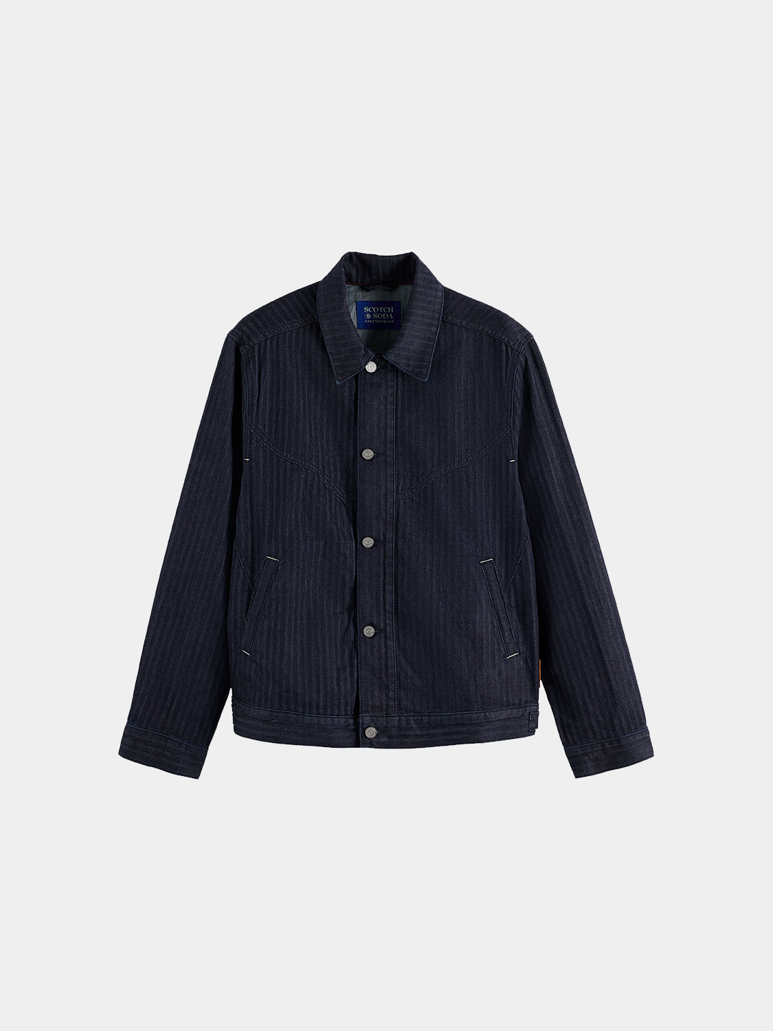SCOTCH & SODA trucker jacket in denim with button front and classic collar, displayed on a hanger.