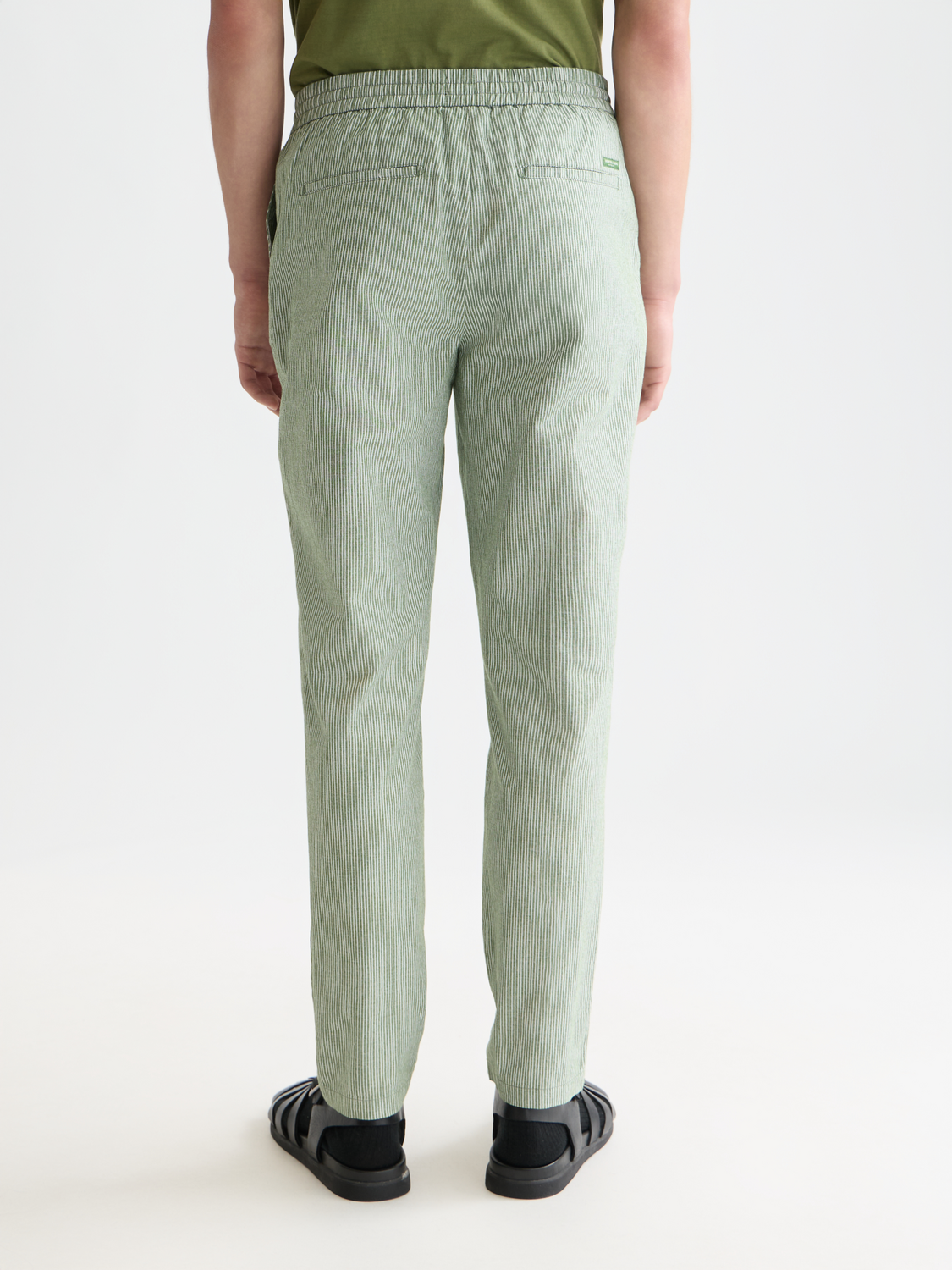 SCOTCH & SODA Warren jogger pants in dark grey, showing back view with relaxed fit and elastic waistband.