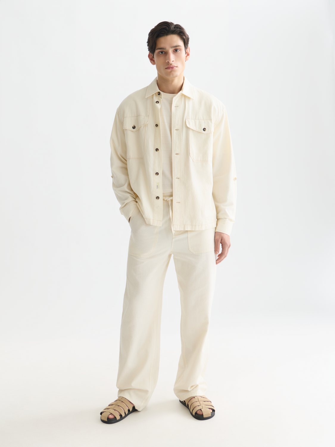 SCOTCH & SODA Otis straight-fit jogger pants in dark fabric, showing front view with waistband and pockets