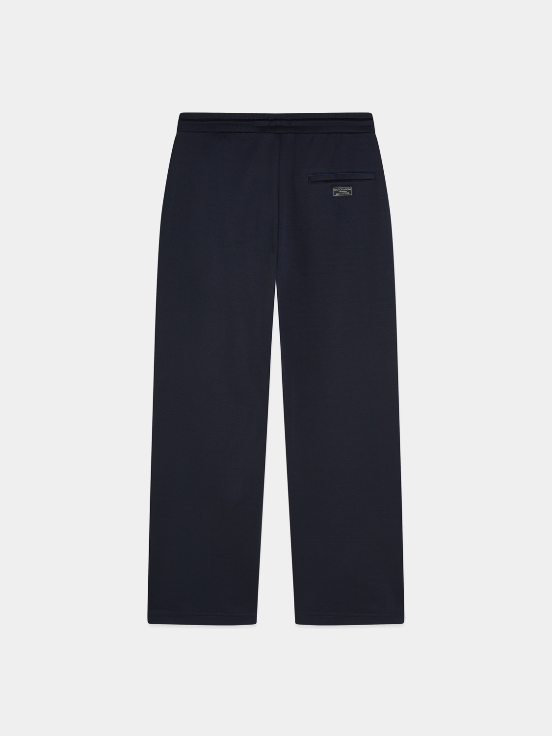 Black Scotch & Soda interlock trackpant sweatpants with elastic waistband and relaxed fit, shown from the back.