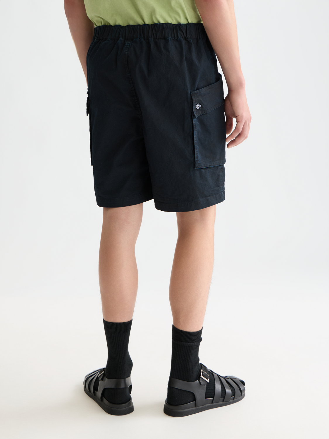 SCOTCH & SODA cargo shorts with multiple pockets, shown from the back, in a casual style perfect for summer wear.