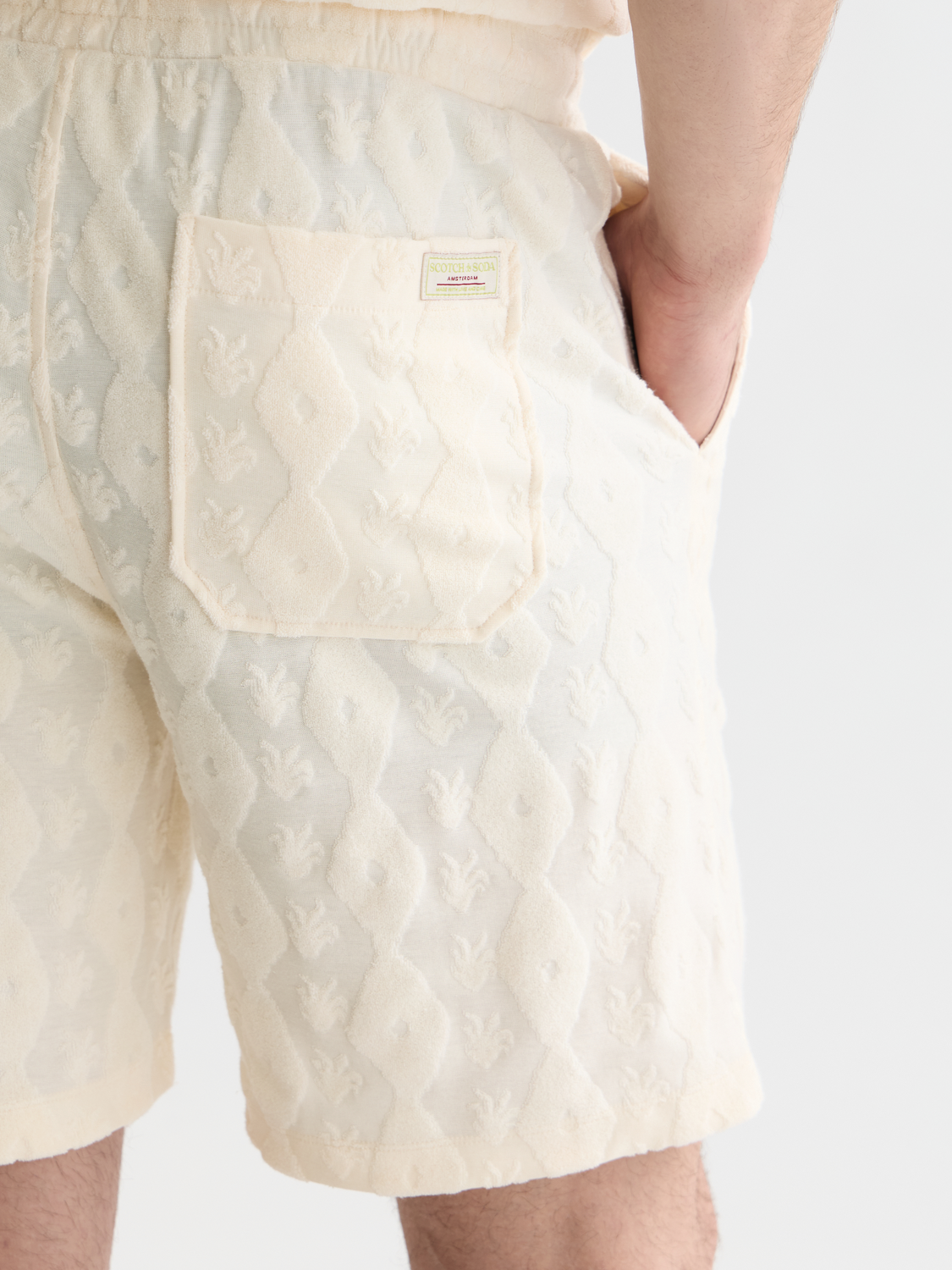 Light gray Fave terry shorts by Scotch & Soda with a relaxed fit, featuring a drawstring waist and casual style.
