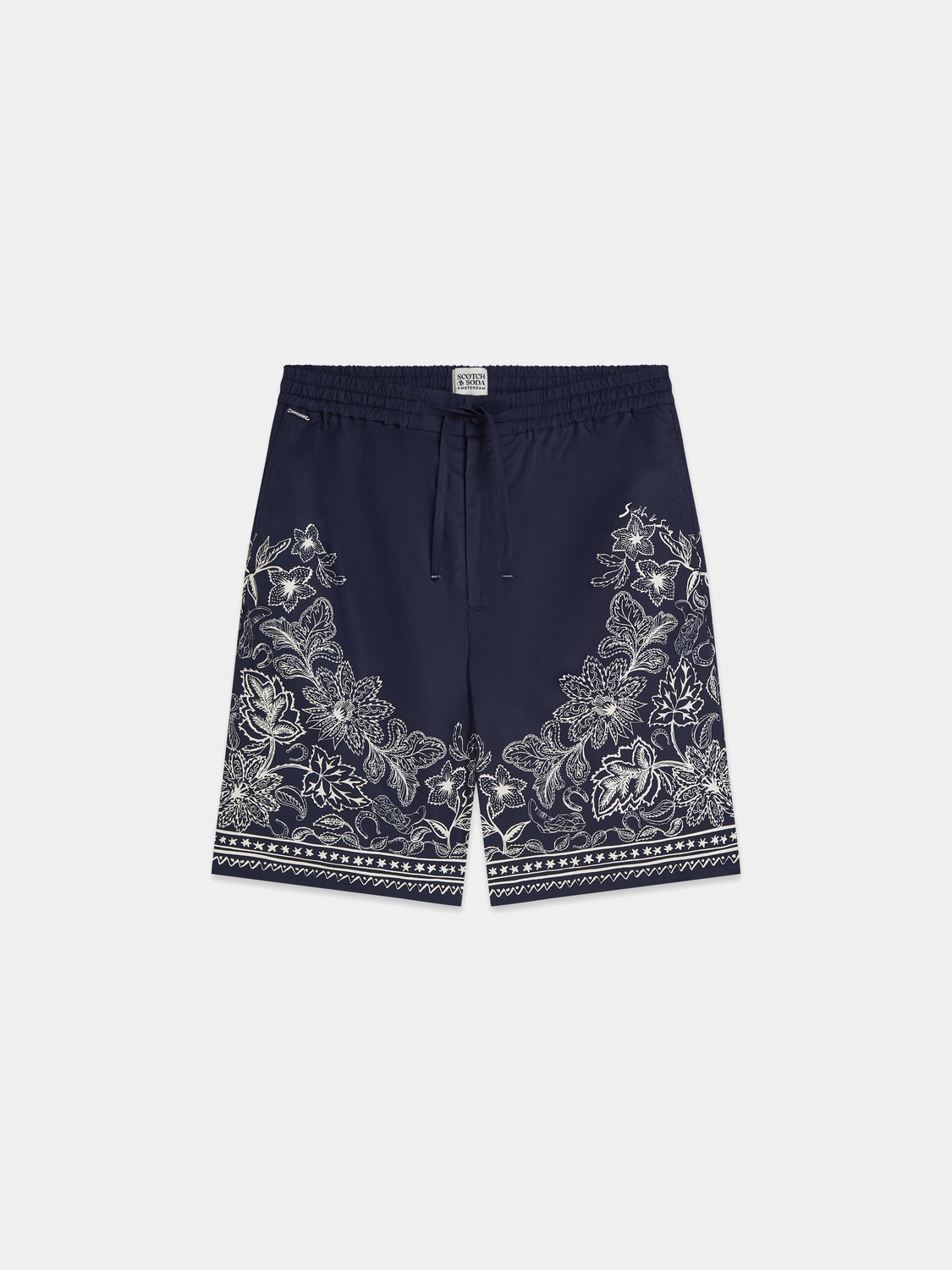 Printed shorts from Scotch & Soda featuring vibrant patterns and a casual fit, suitable for warm weather and everyday wear.