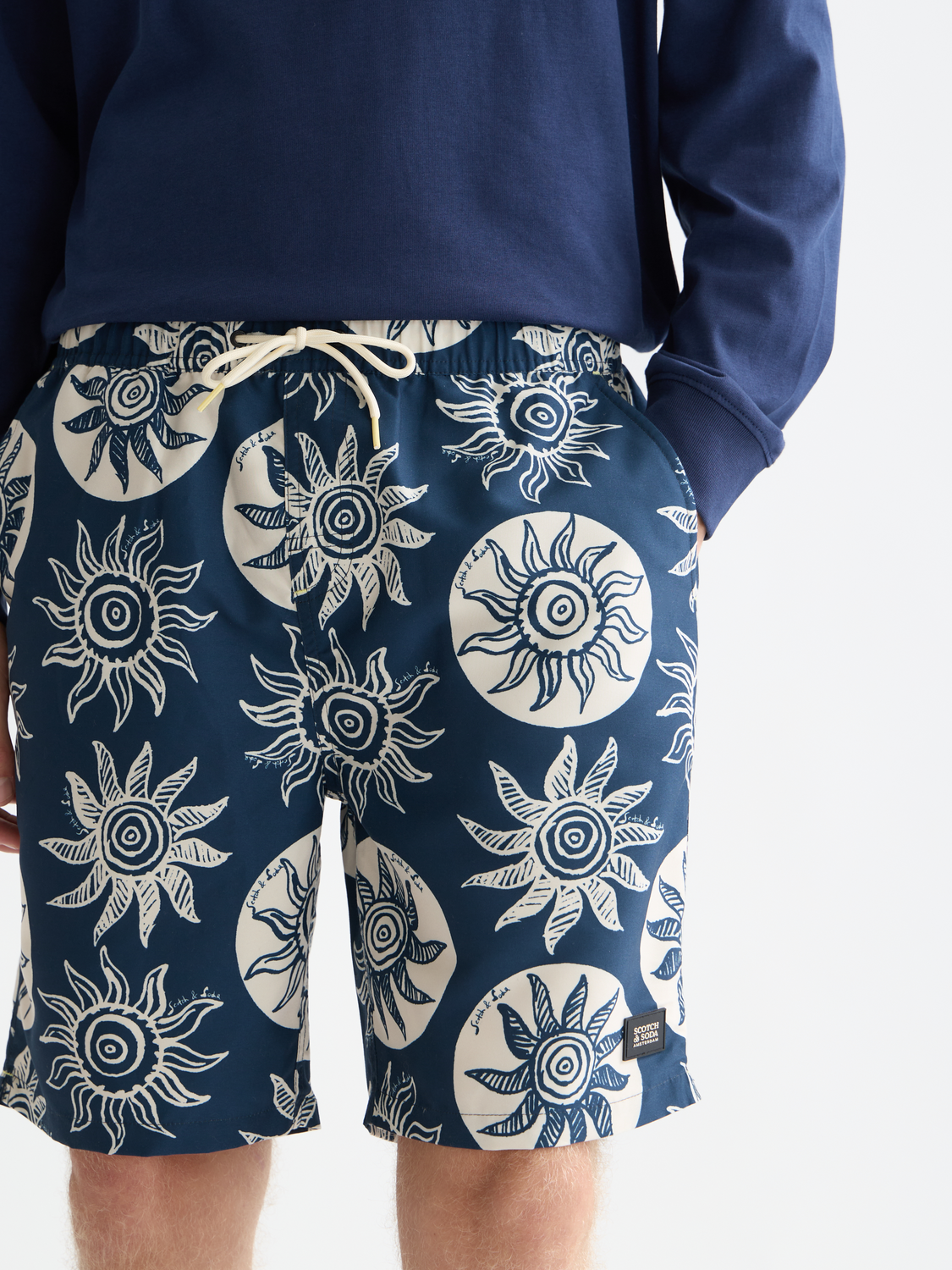 Printed swimshorts by Scotch & Soda featuring vibrant patterns, lightweight fabric, and comfortable fit for beach or pool use.