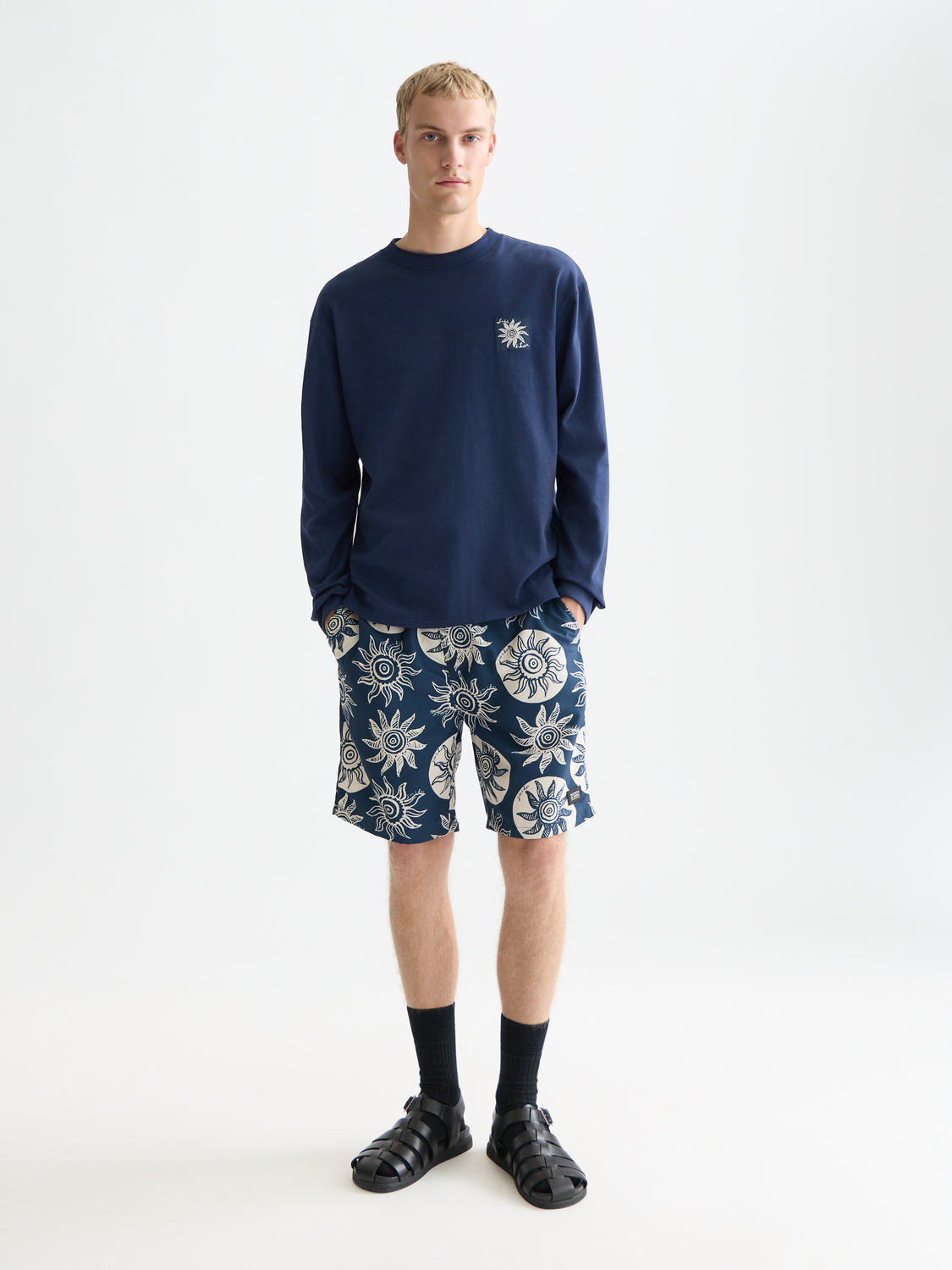 Printed SCOTCH & SODA swimshorts featuring bold colorful patterns, designed for comfortable and stylish swimwear.