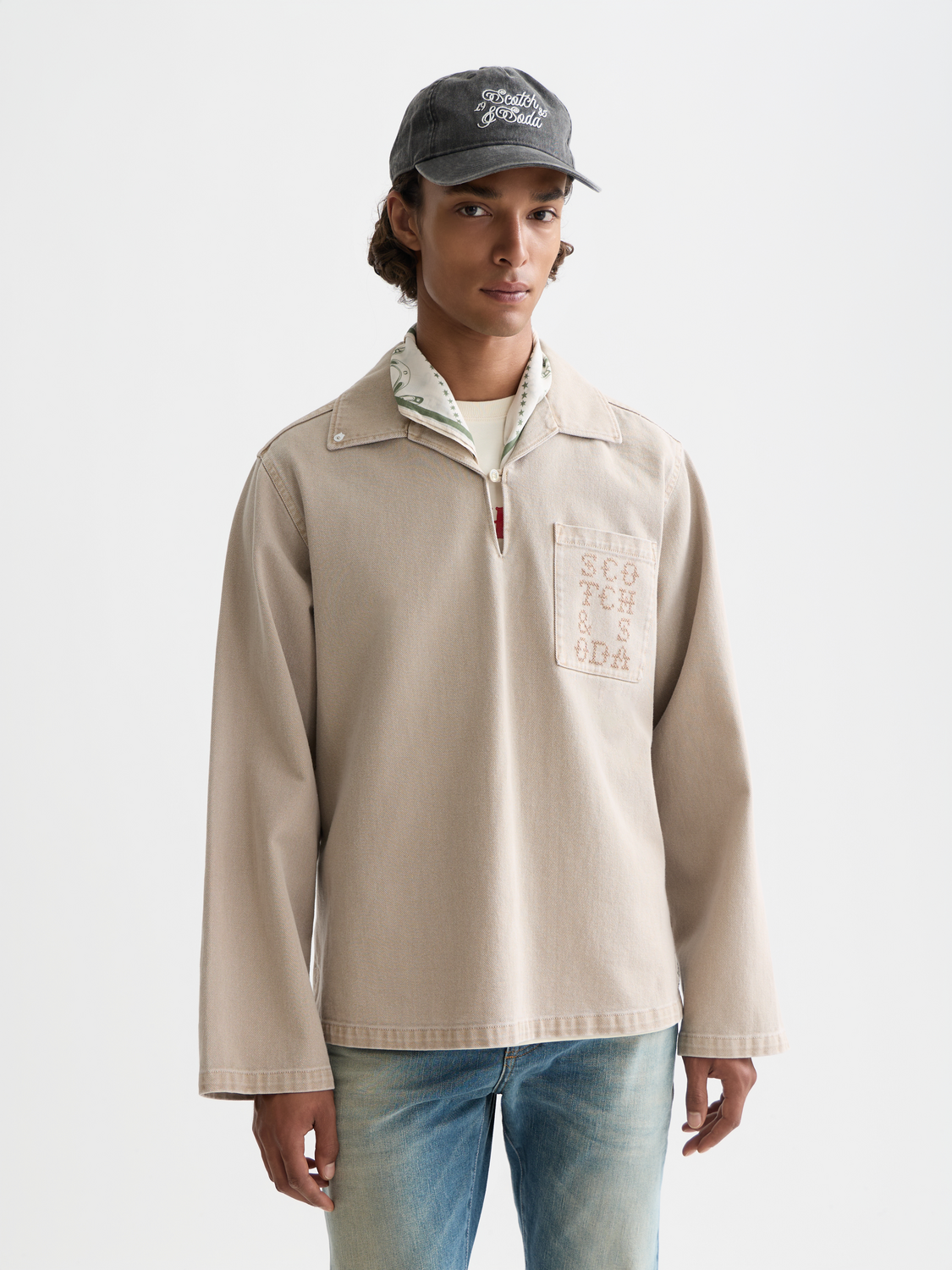 Washed overshirt jacket by Scotch & Soda featuring a casual fit, button front, and soft, distressed fabric in a versatile style.