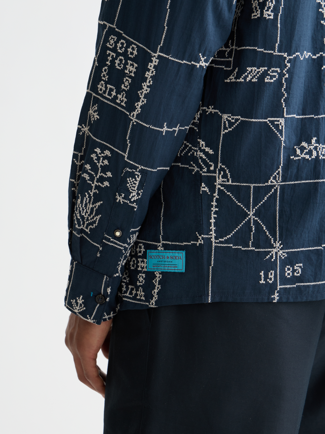 Long sleeve embroidered shirt by Scotch & Soda featuring intricate embroidery and stylish casual fit.