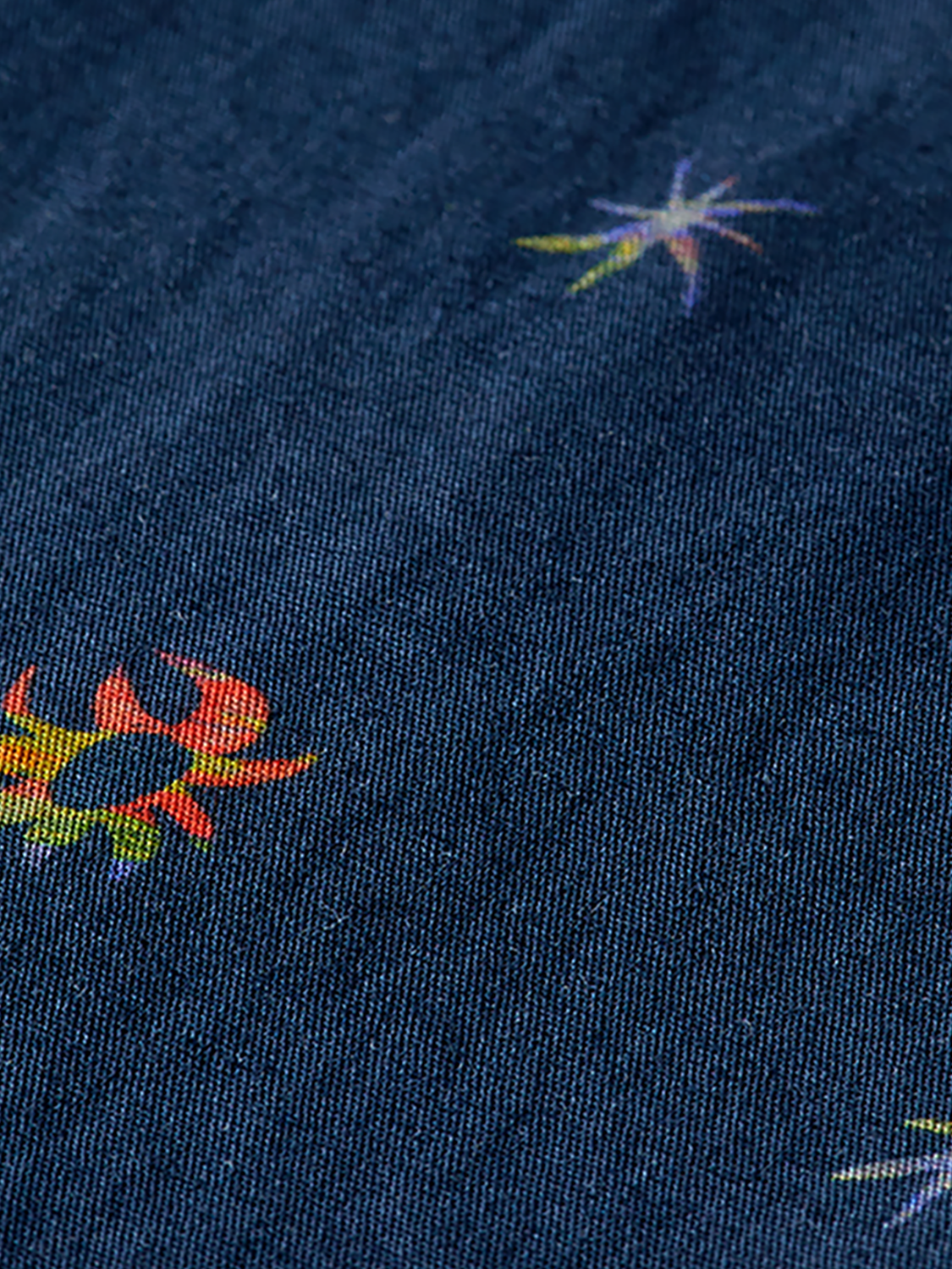 Long-sleeve printed shirt by Scotch & Soda featuring vibrant patterns and casual fit, displayed on a neutral background.