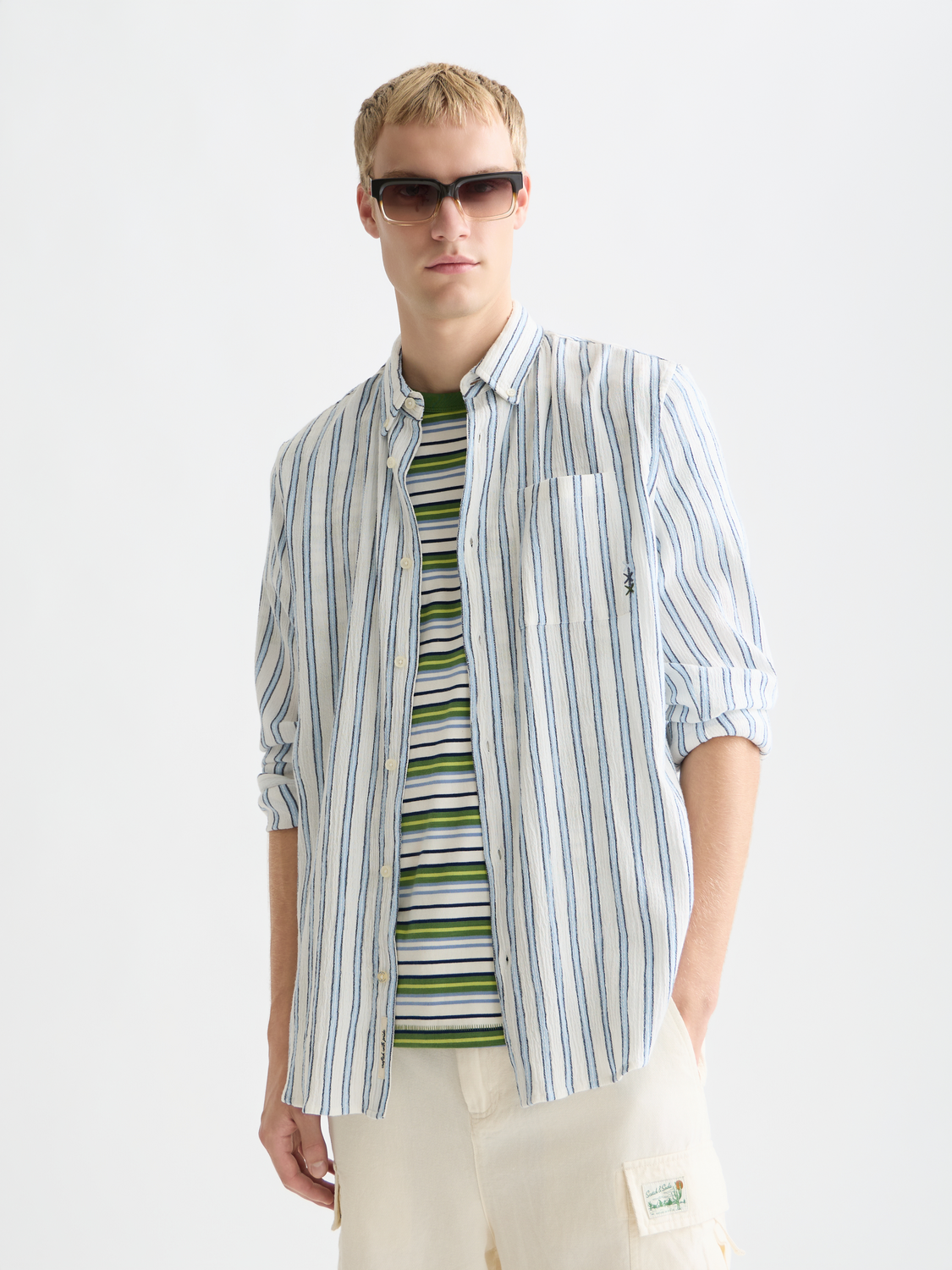 Long sleeve striped crinkle shirt by Scotch & Soda, showcasing a casual fit with vibrant vertical stripes and textured fabric.
