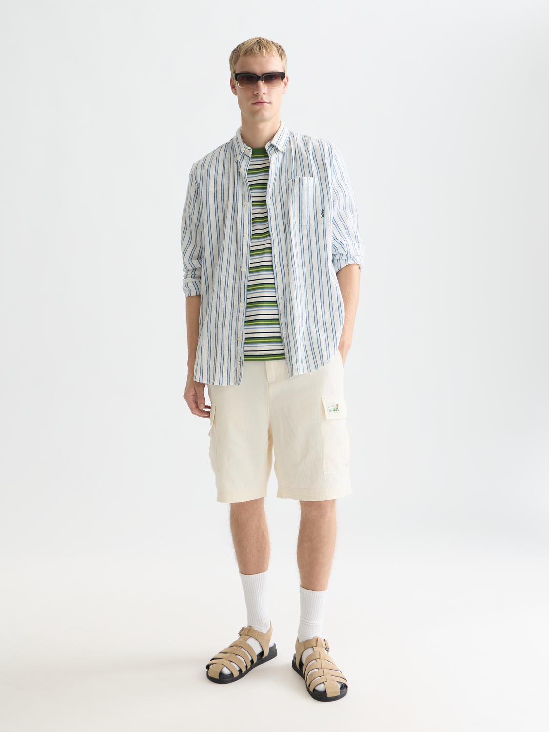 Long sleeve striped crinkle shirt by Scotch & Soda, showing its colorful pattern and relaxed fit.
