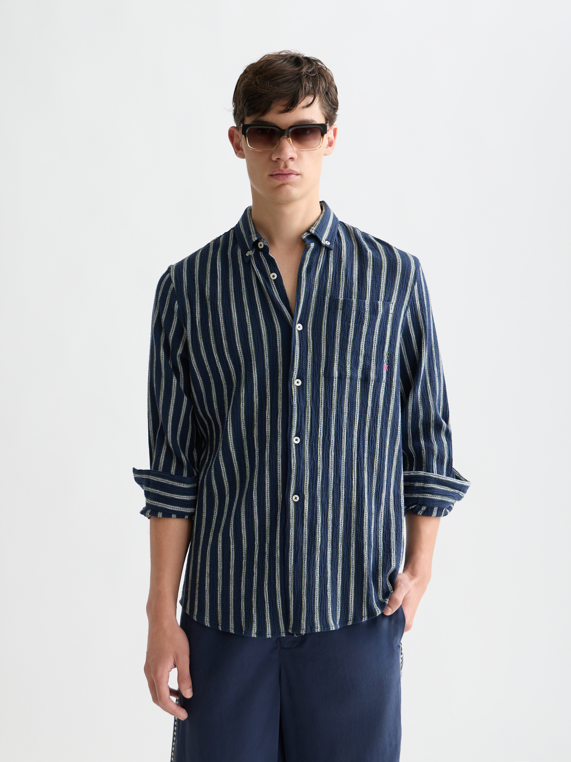 Long sleeve striped crinkle shirt by Scotch & Soda, showcasing a casual fit with bold vertical stripes and textured fabric.