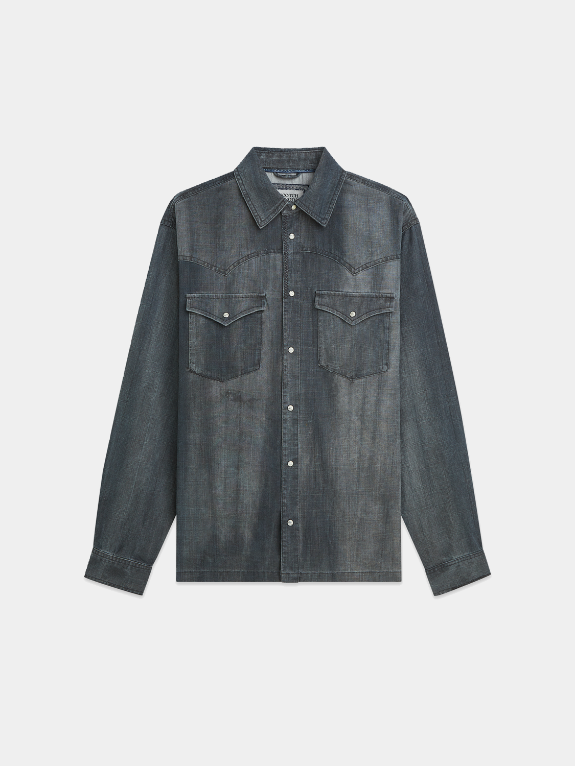 Long-sleeve washed denim shirt by Scotch & Soda, showing a casual button-up design with front chest pockets.