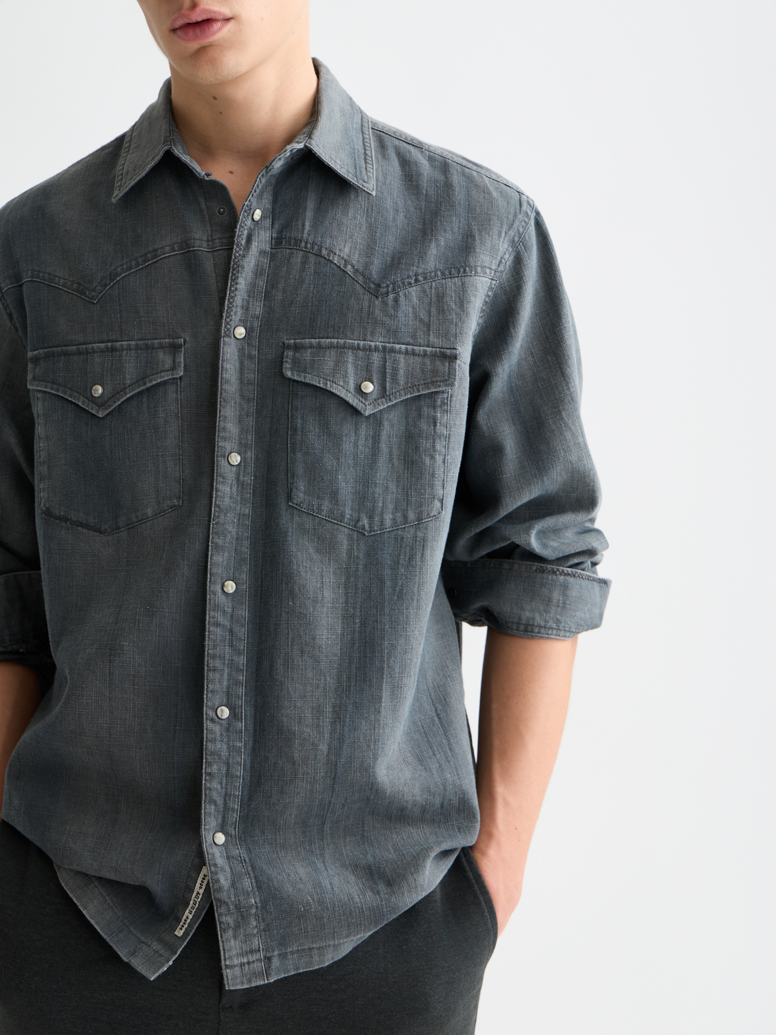 Light blue washed denim long-sleeve shirt from Scotch & Soda, featuring a casual fit and button-down front.