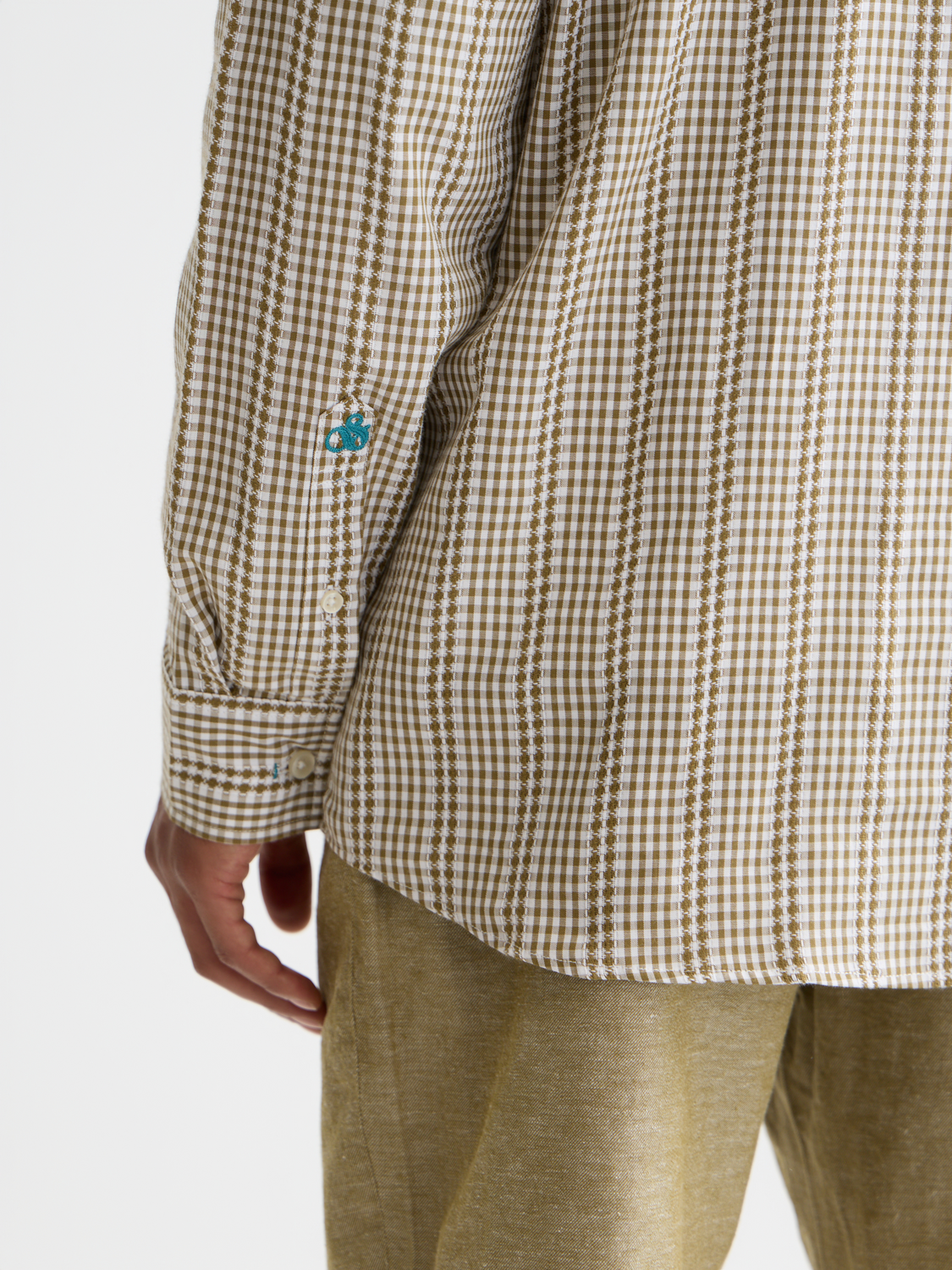 Long sleeve Scotch & Soda poplin microcheck shirt with button-up front and classic collar, displayed on a hanger.