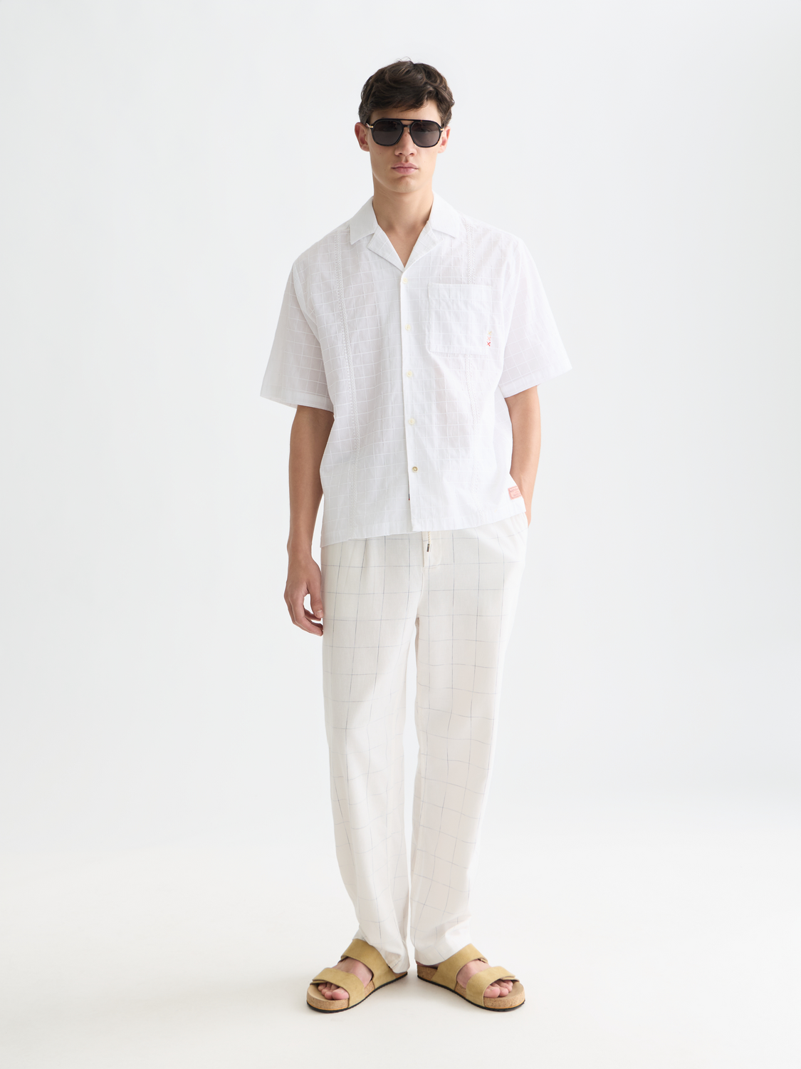 Embroidered Scotch & Soda short-sleeved shirt with colorful floral details, showcasing a stylish casual summer top.