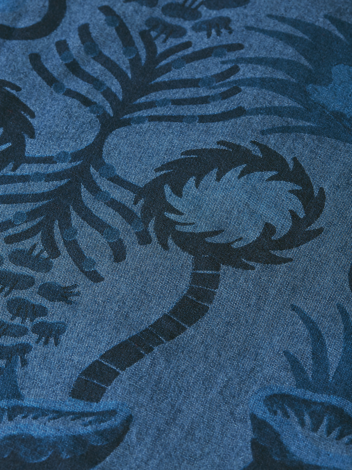 Printed short-sleeved shirt from Scotch & Soda featuring vibrant design and casual fit, perfect for warm weather.