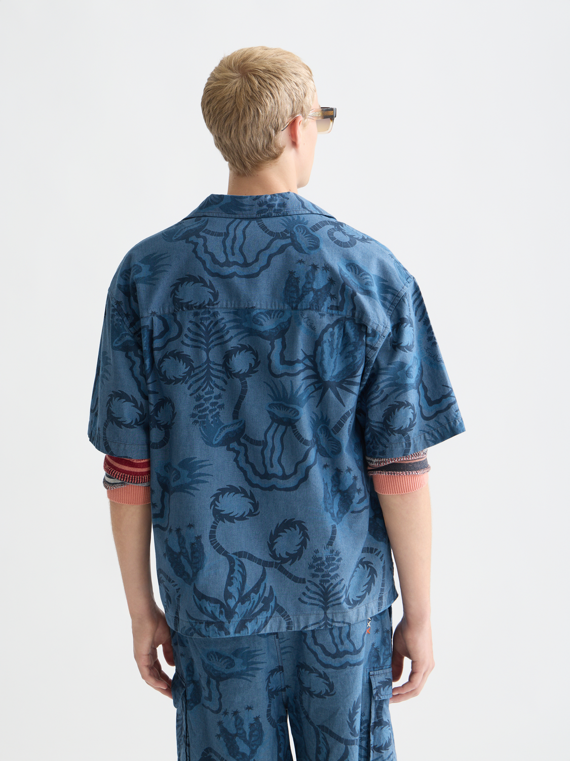 Printed short-sleeved shirt by Scotch & Soda, featuring a stylish design, shown from the back with a relaxed fit and vibrant pattern.