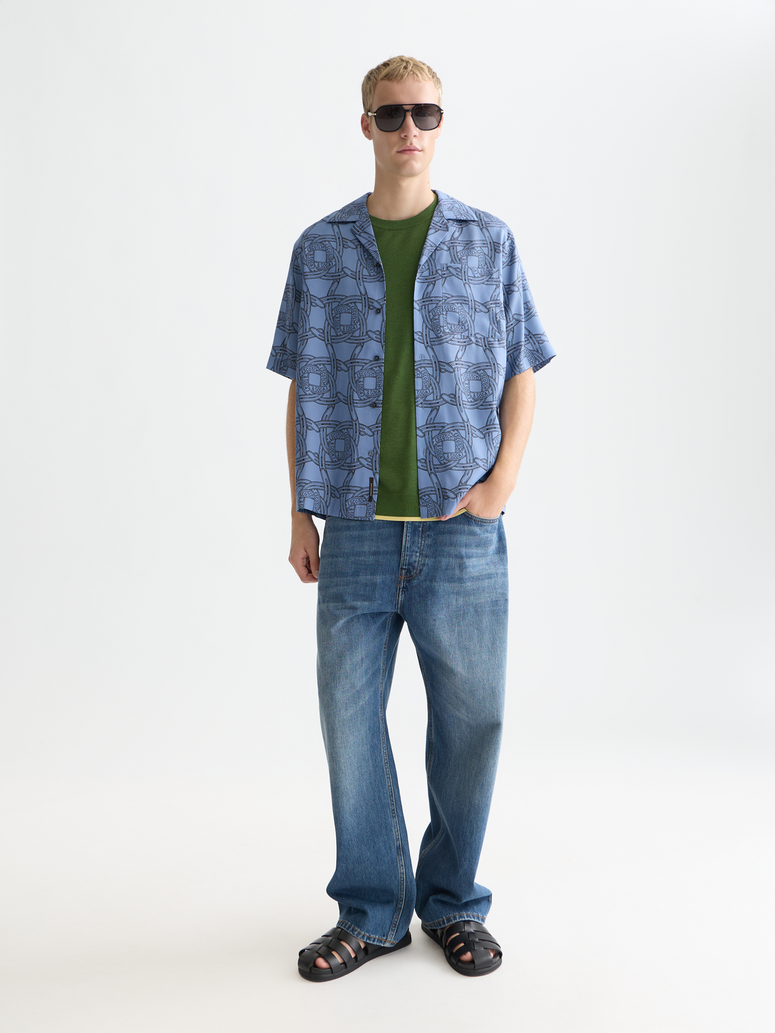 Printed short-sleeved shirt by Scotch & Soda featuring a vibrant, patterned design and classic collar detail.