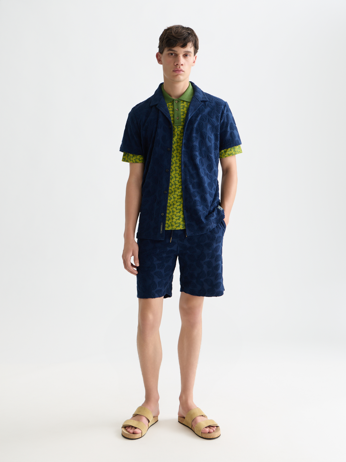 Short-sleeved Scotch & Soda terry jacquard shirt with a textured pattern, displayed on a plain background.