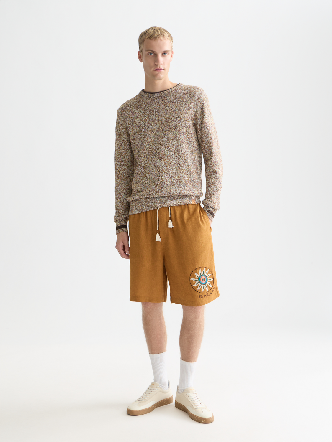 Scotch & Soda melange knitwear pullover with a cozy, textured fabric, featuring a round neckline and long sleeves.