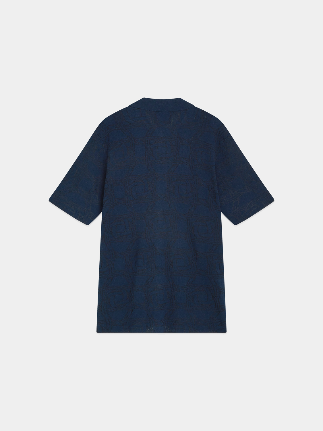 Knitted jacquard short-sleeved shirt by Scotch & Soda, featuring intricate knit patterns in black.