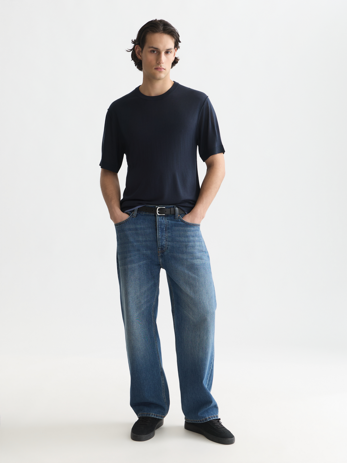 Knitted T-shirt by Scotch & Soda, soft knitwear with a casual fit, displayed on a plain background.