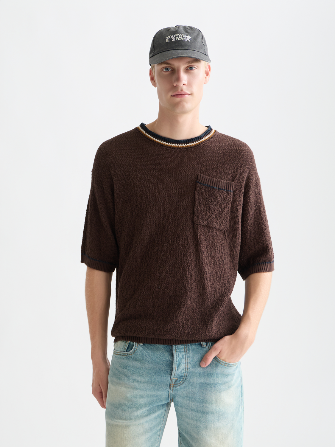 Blue knitted T-shirt from Scotch & Soda, featuring a textured knitwear design and a classic fit.