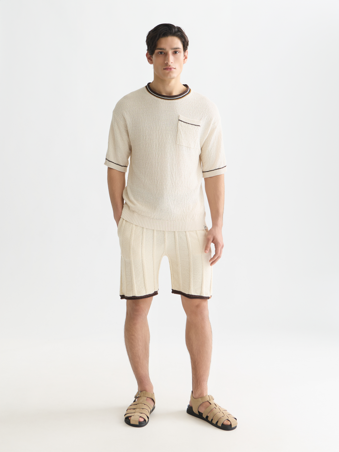 Scotch & Soda knitted t-shirt, a stylish knitwear piece with a textured design, shown in a close-up of the front view.