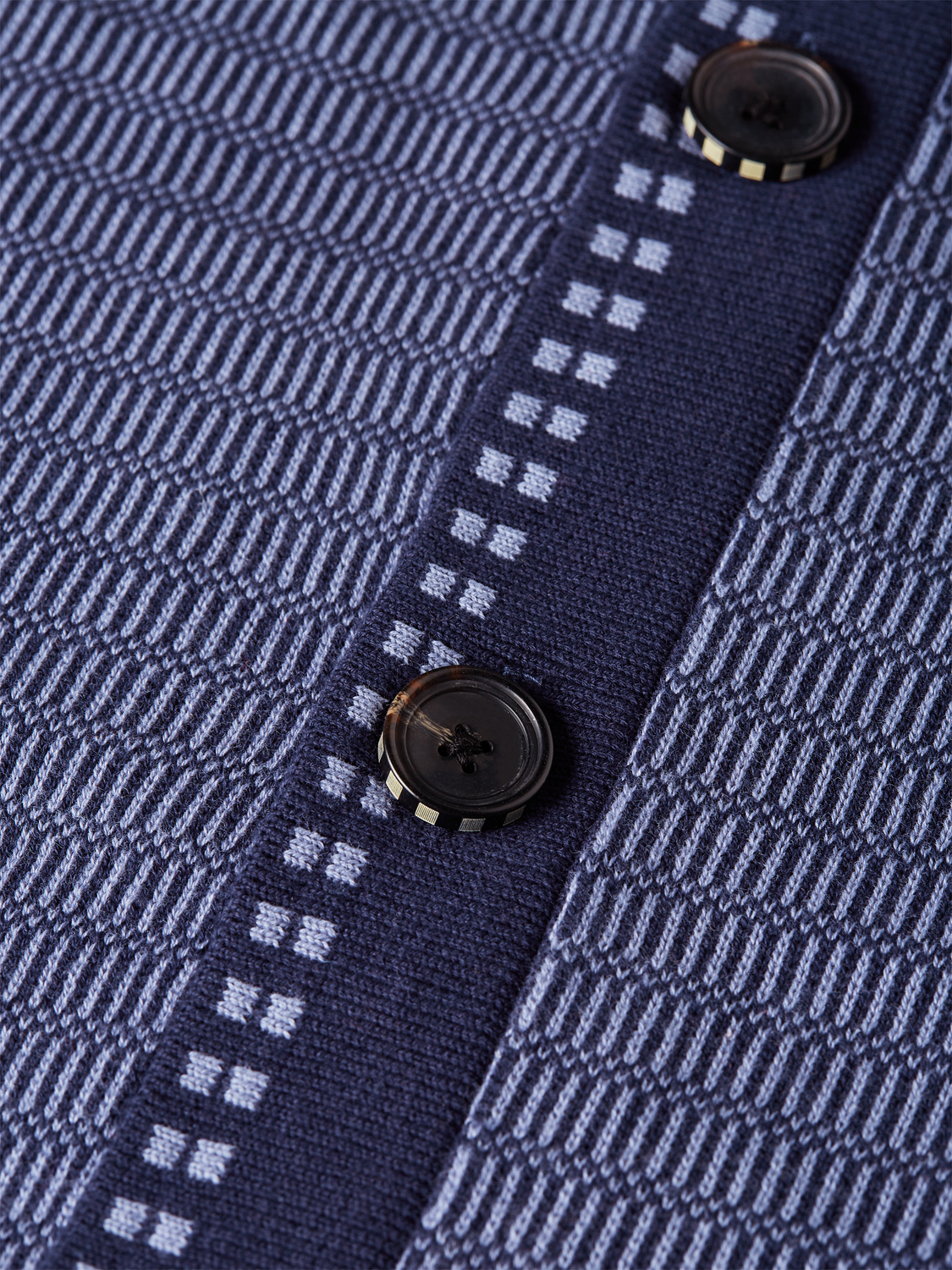 SCOTCH & SODA polo cardigan knitwear featuring a classic design and button-up front, displayed on a neutral background.
