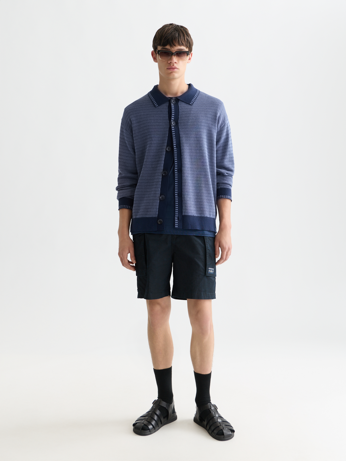Scotch & Soda polo cardigan knitwear with button front and classic design, displayed on a neutral background.