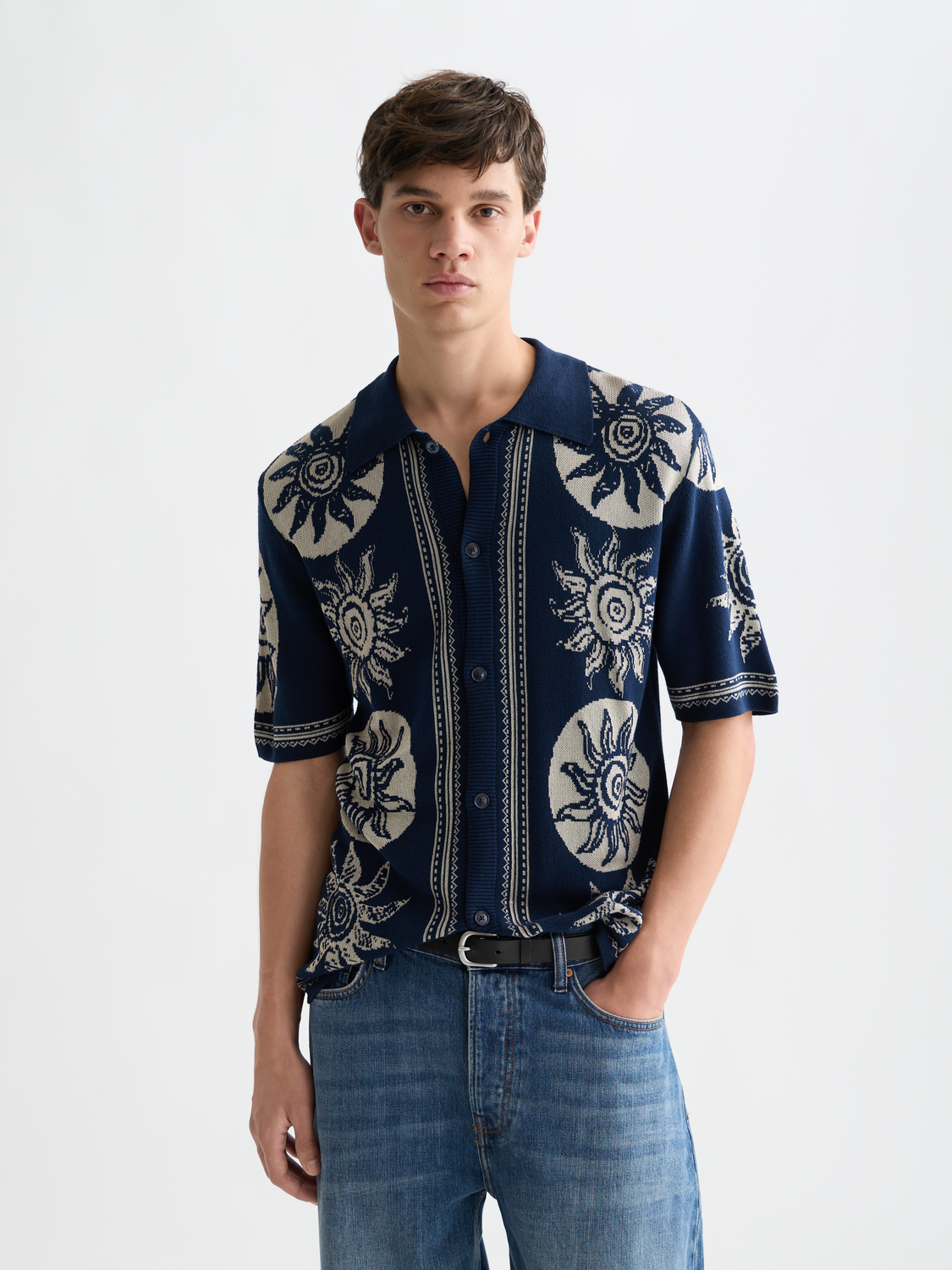 Knitted jacquard short-sleeved shirt from Scotch & Soda, featuring intricate patterns and a comfortable knitwear design.
