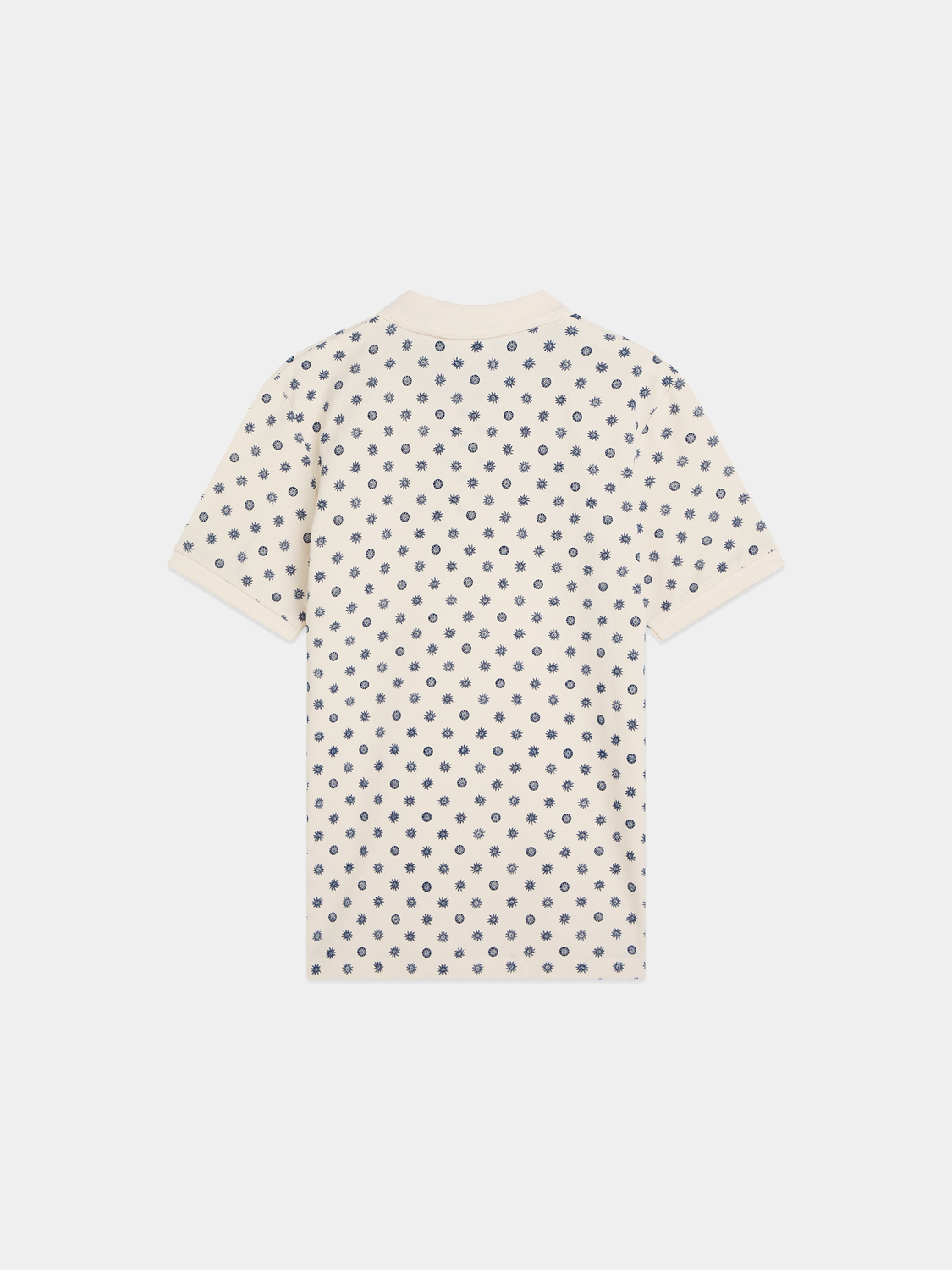 Back view of a printed Scotch & Soda polo shirt with a colorful patterned design on a white fabric.