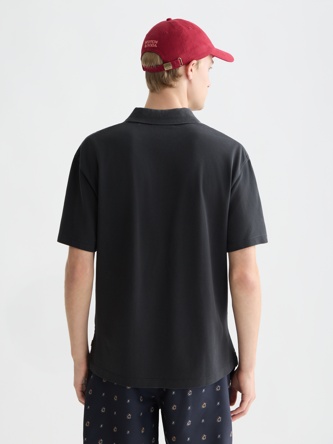 Navy Scotch & Soda pique polo shirt with collar and short sleeves, displayed from the back.