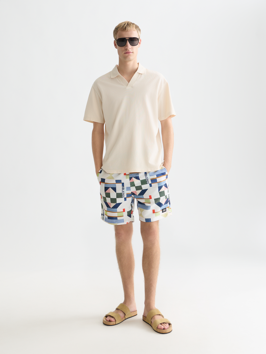 Navy Scotch & Soda pique polo shirt with a classic collar and short sleeves, displayed flat on a white background.
