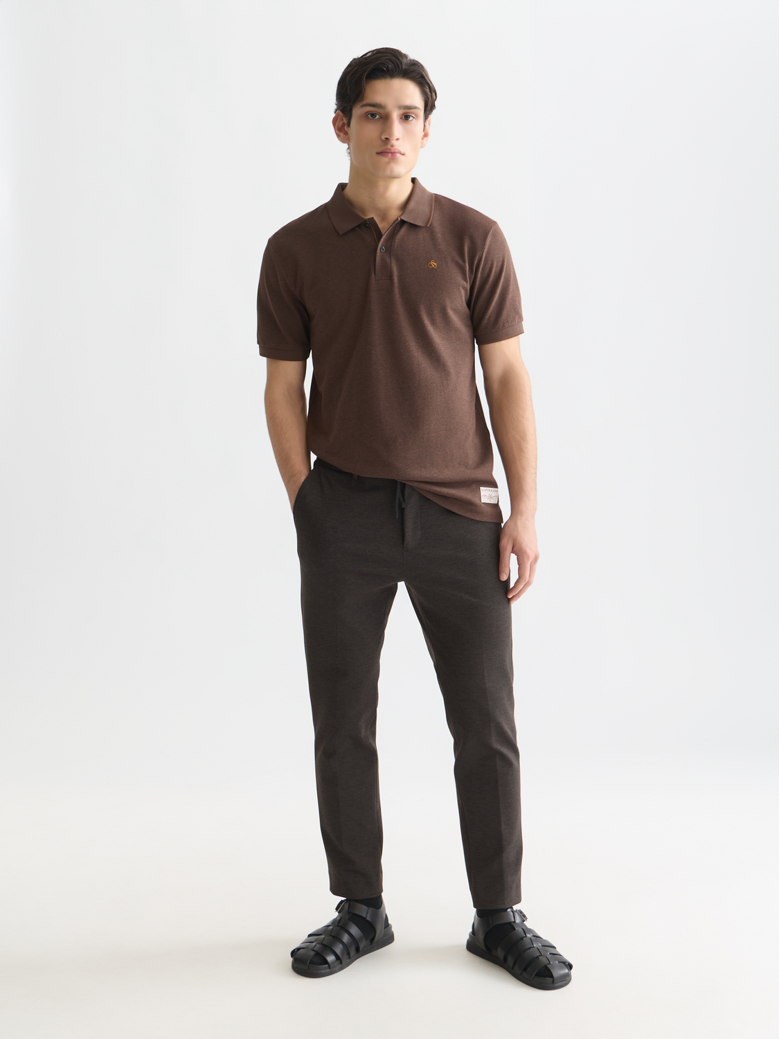 Navy Scotch & Soda Melange polo shirt with a classic collar and short sleeves, displayed on a plain background.