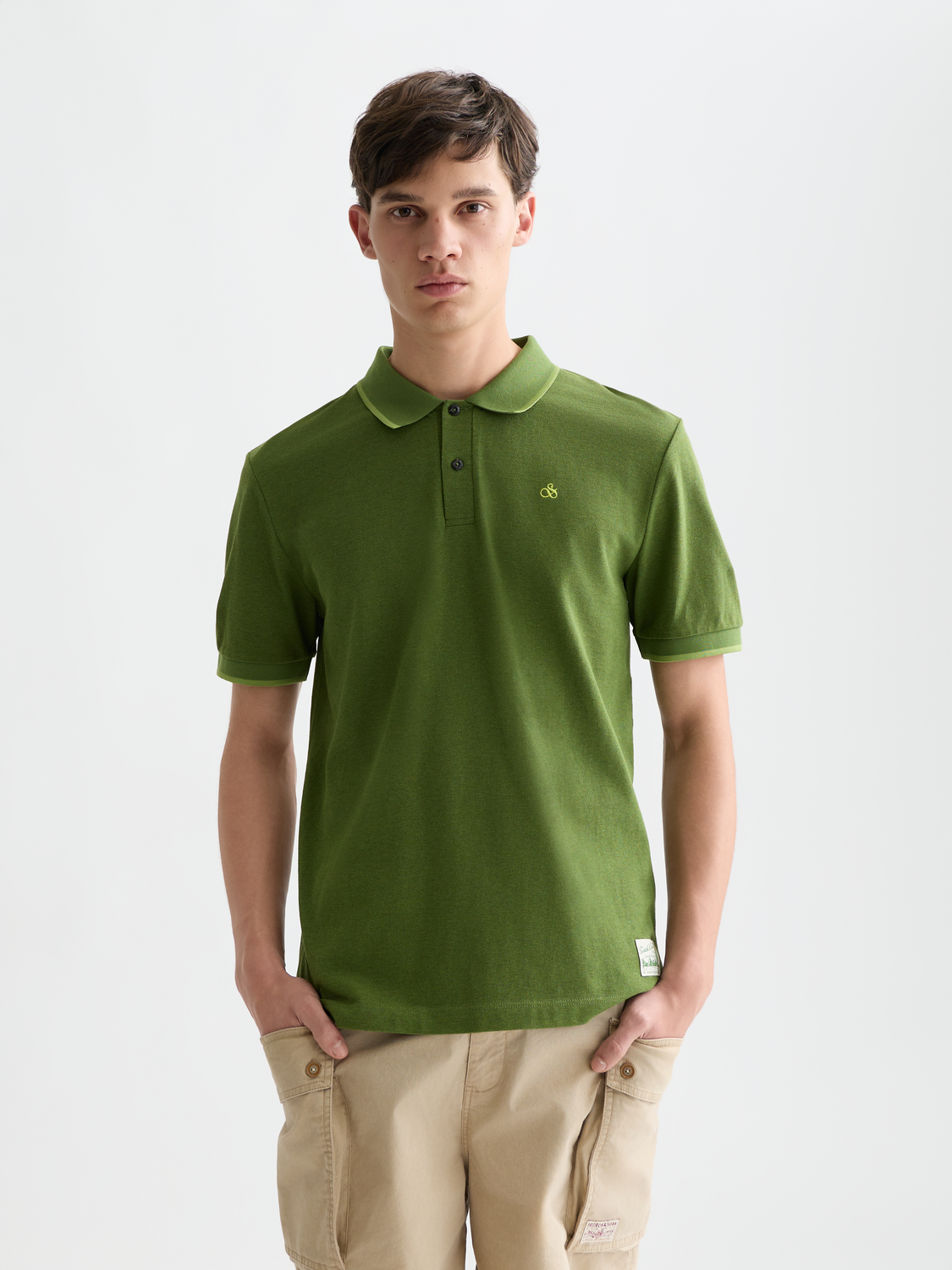 Scotch & Soda melange polo shirt in grey with a classic collar and short sleeves, displayed on a plain background.