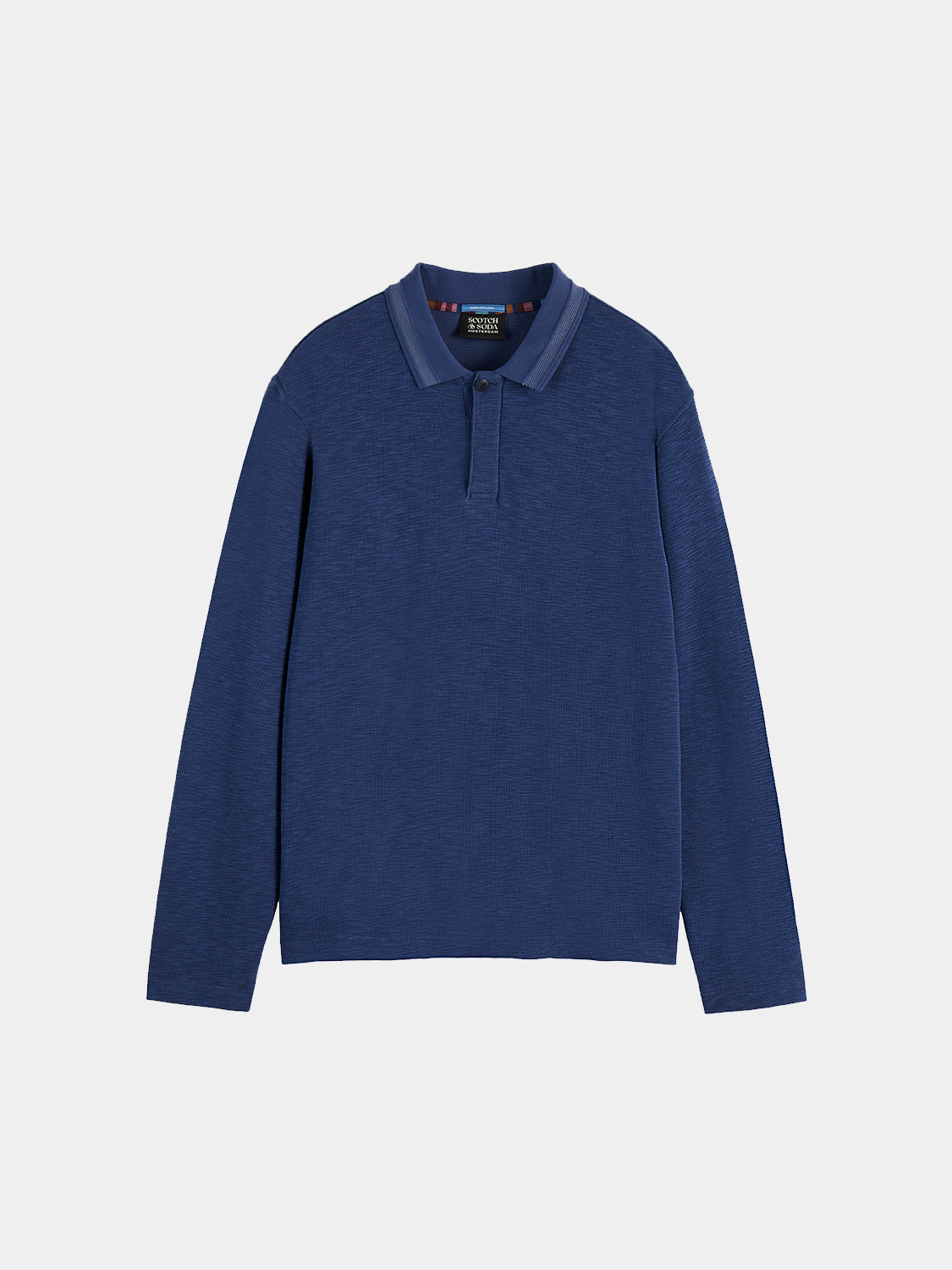 Long-sleeved SCOTCH & SODA polo shirt in navy with a classic collar and button placket, displayed on a mannequin.