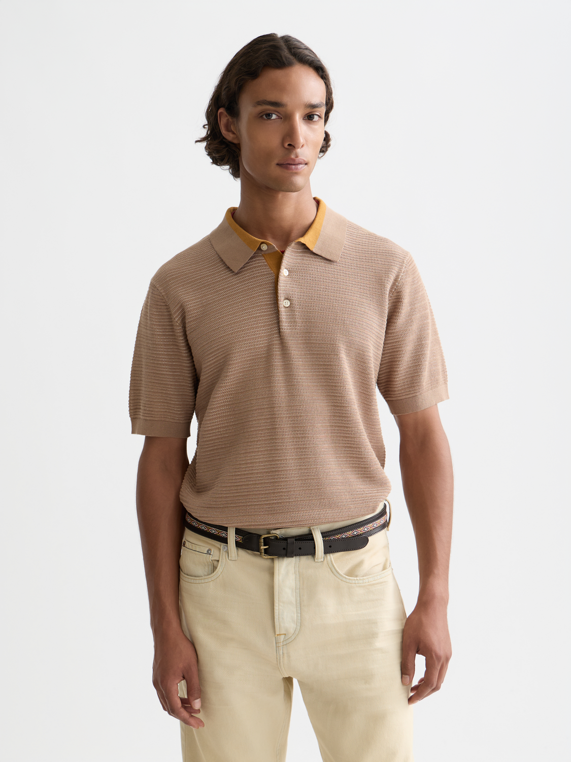 Structured knit polo shirt from Scotch & Soda featuring a classic polo collar and textured knit fabric.