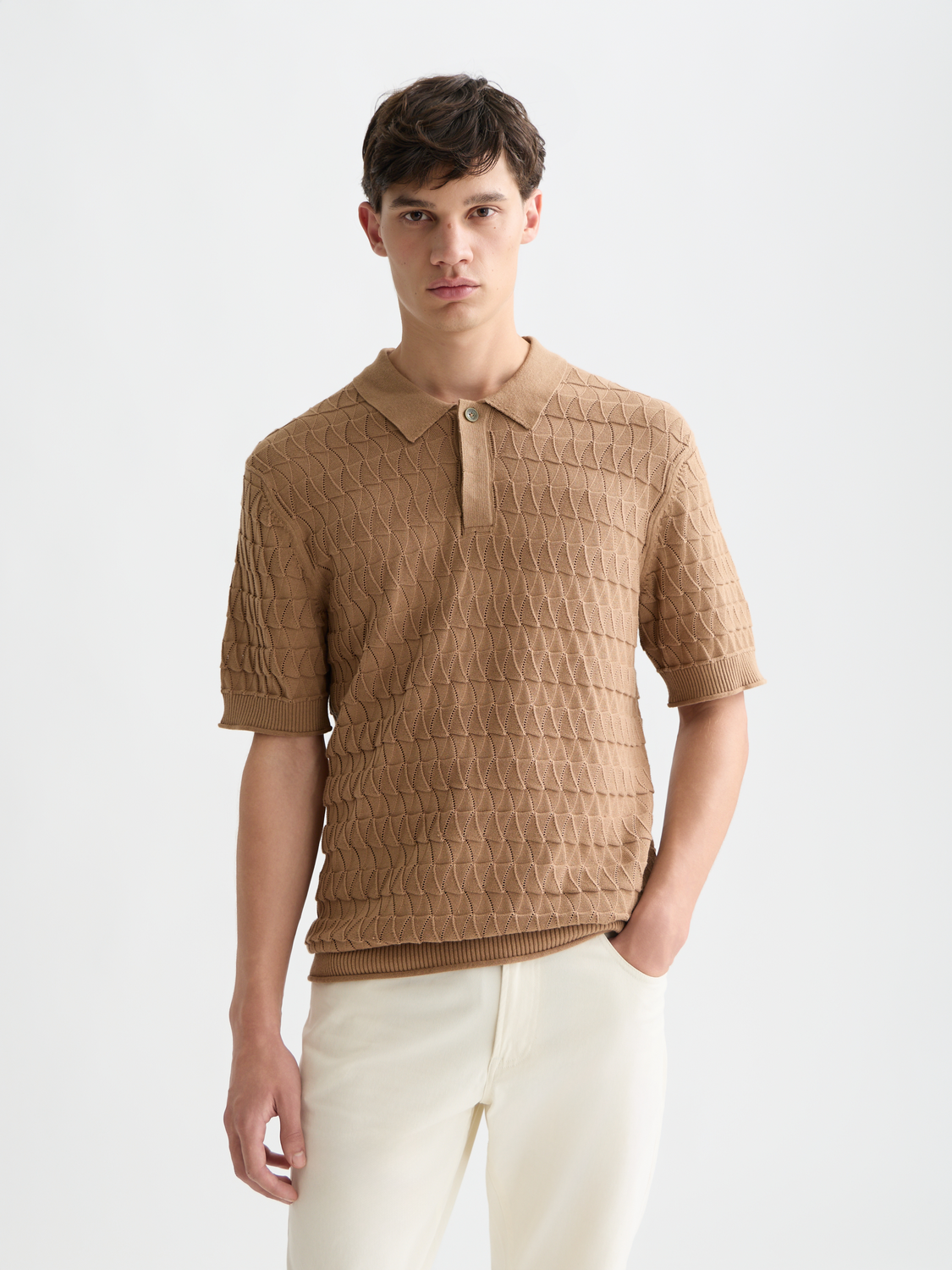 Scotch & Soda knitted polo shirt in a classic design, featuring a textured knit pattern and a collared neckline.