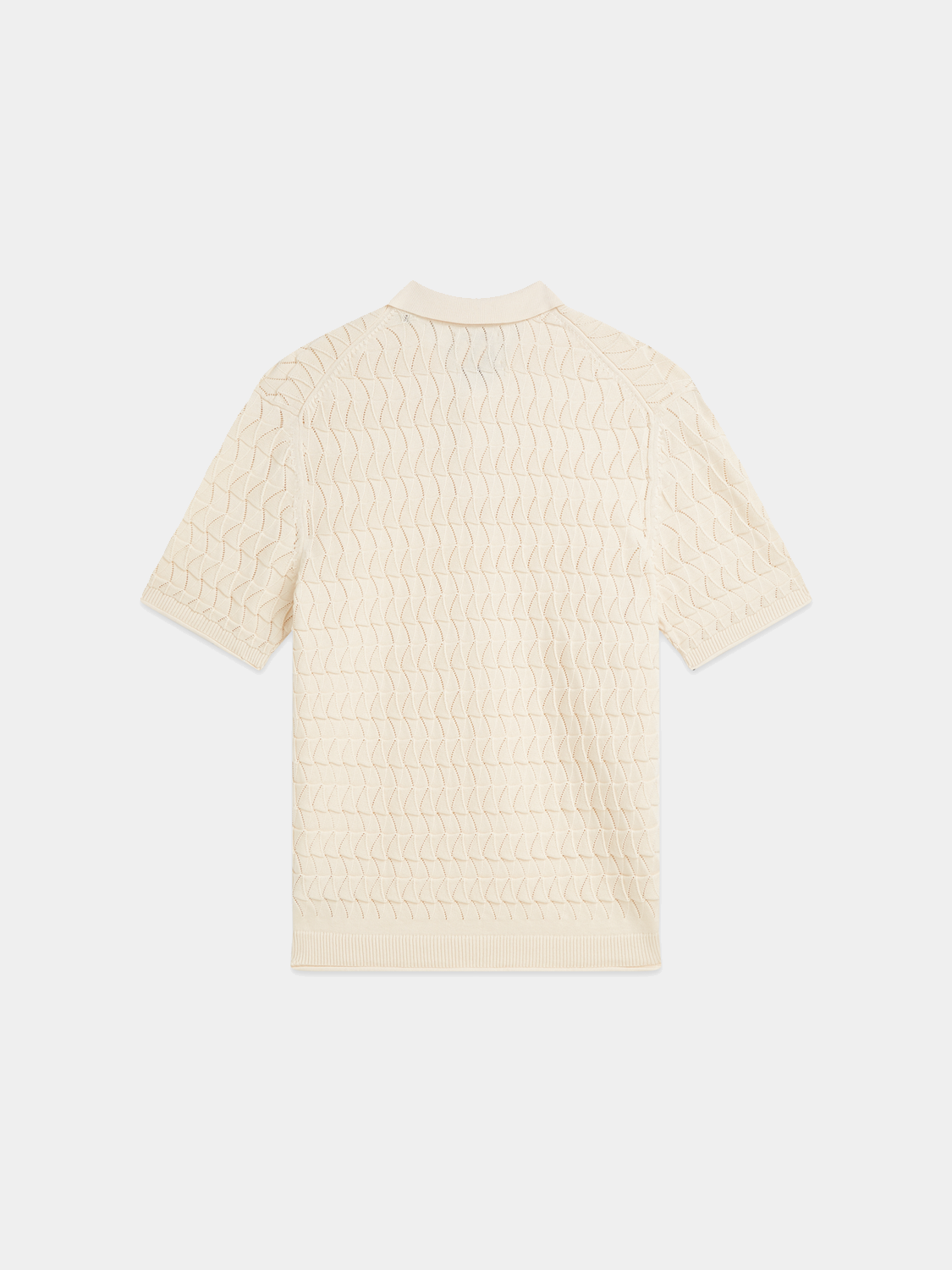 Knitted SCOTCH & SODA polo shirt, front view showing classic collar and textured knit fabric.