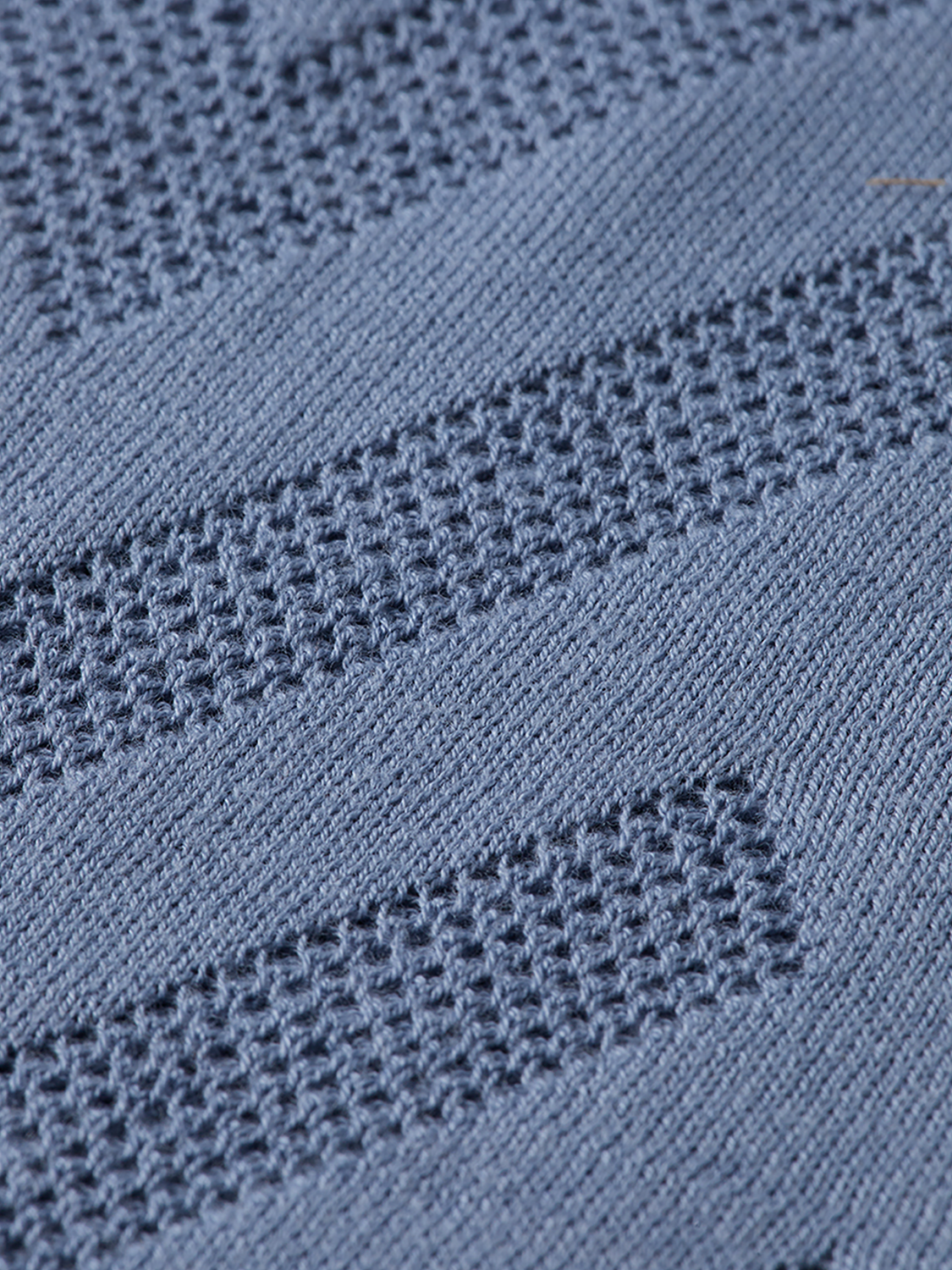 Long-sleeved polo shirt by Scotch & Soda in navy blue, featuring a collared neckline and button front.