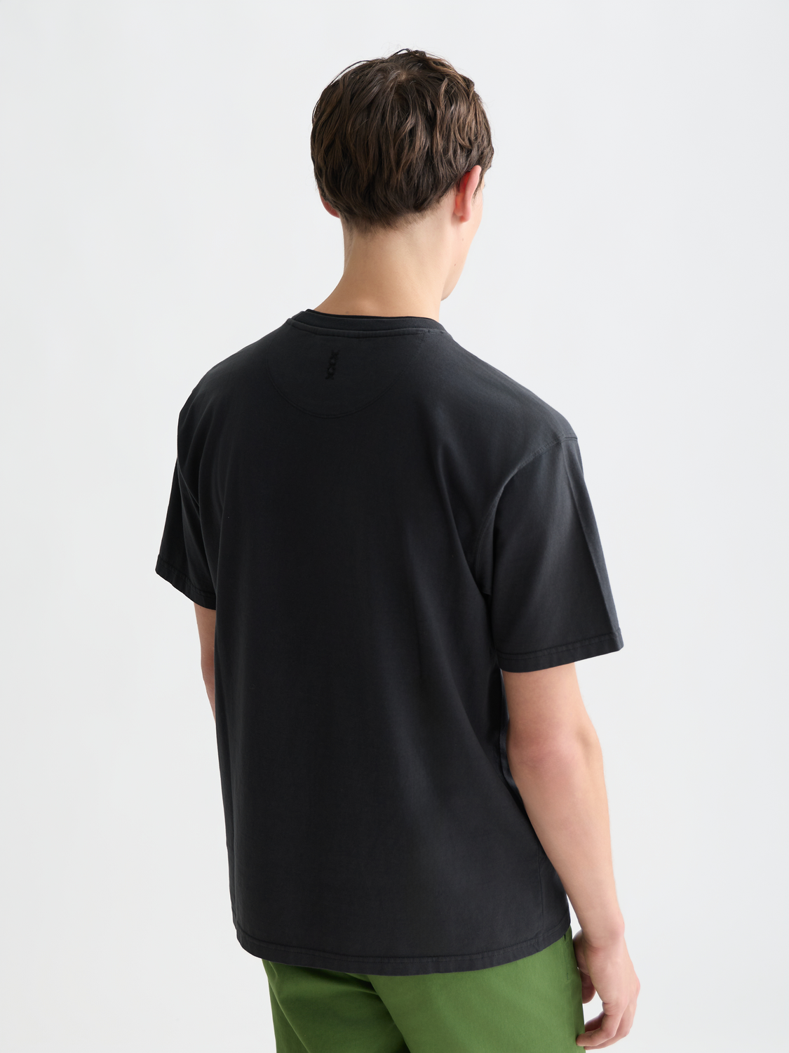 Scarlet garment-dyed Scotch & Soda short-sleeve T-shirt showing back view with relaxed fit and soft fabric texture.