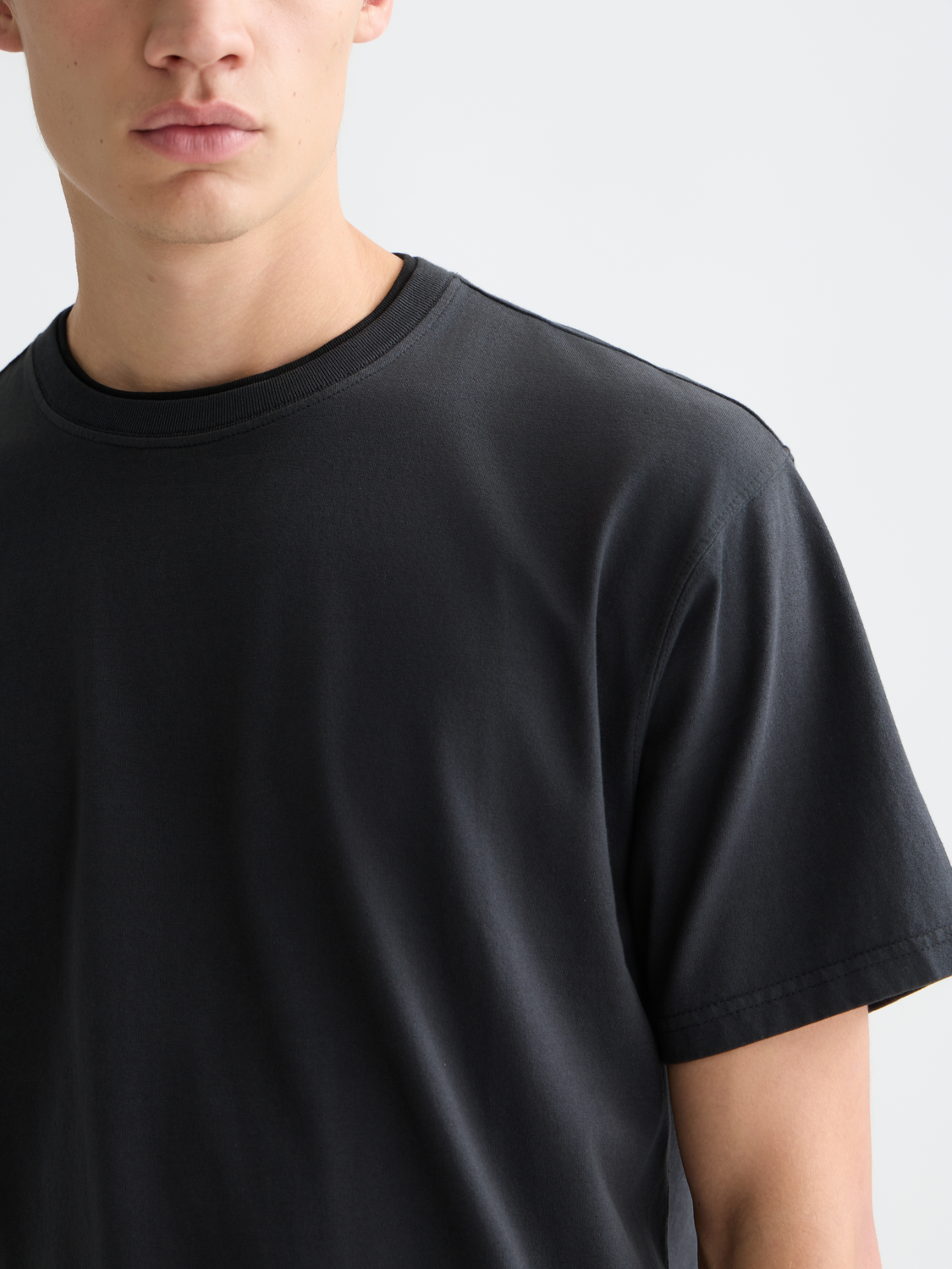 Scarlet garment-dyed SCOTCH & SODA short-sleeve t-shirt displayed flat, showcasing its soft fabric and relaxed fit.