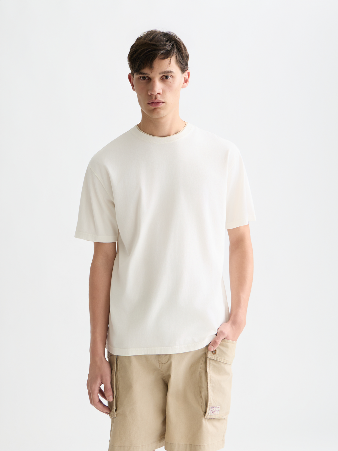 Light blue Scotch & Soda short sleeve garment-dyed T-shirt with a crew neck and soft fabric, displayed front view.