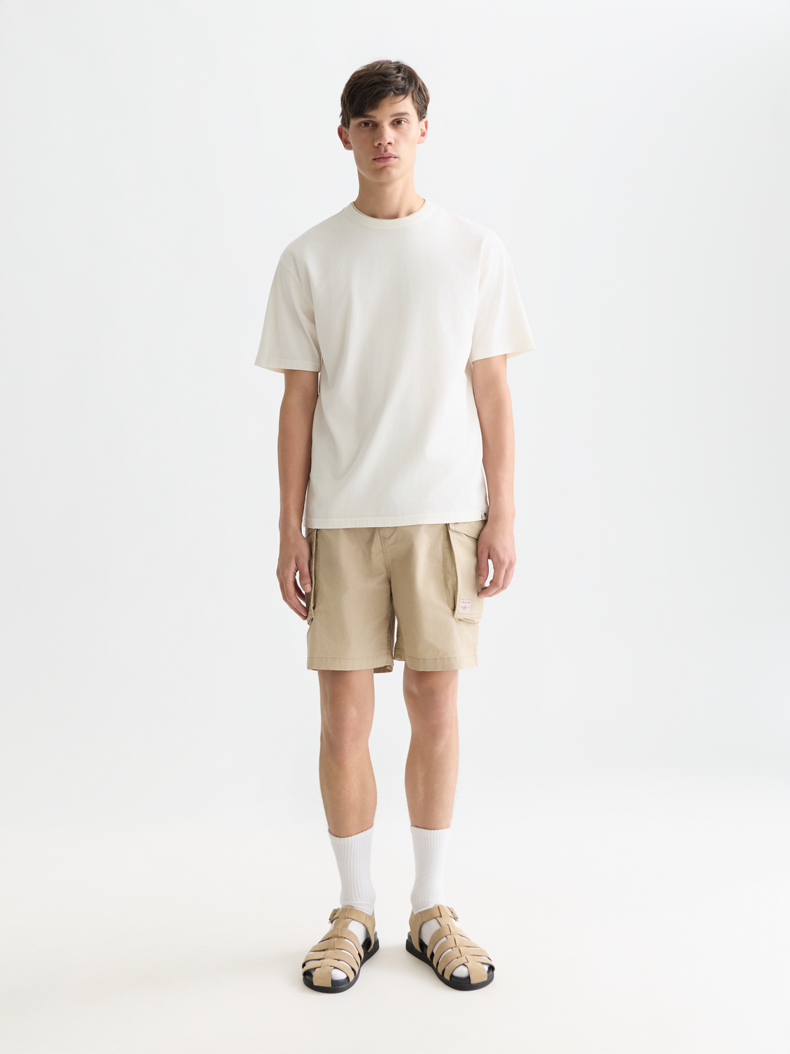 Light blue garment-dyed S/S T-shirt by Scotch & Soda with a relaxed fit and soft fabric, front view.
