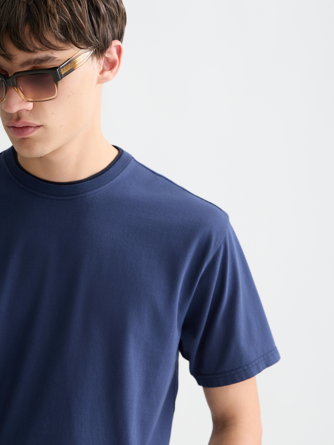 Slim fit garment-dyed SCOTCH & SODA short sleeve T-shirt in vibrant color, displayed flat with neckline and sleeve details visible.